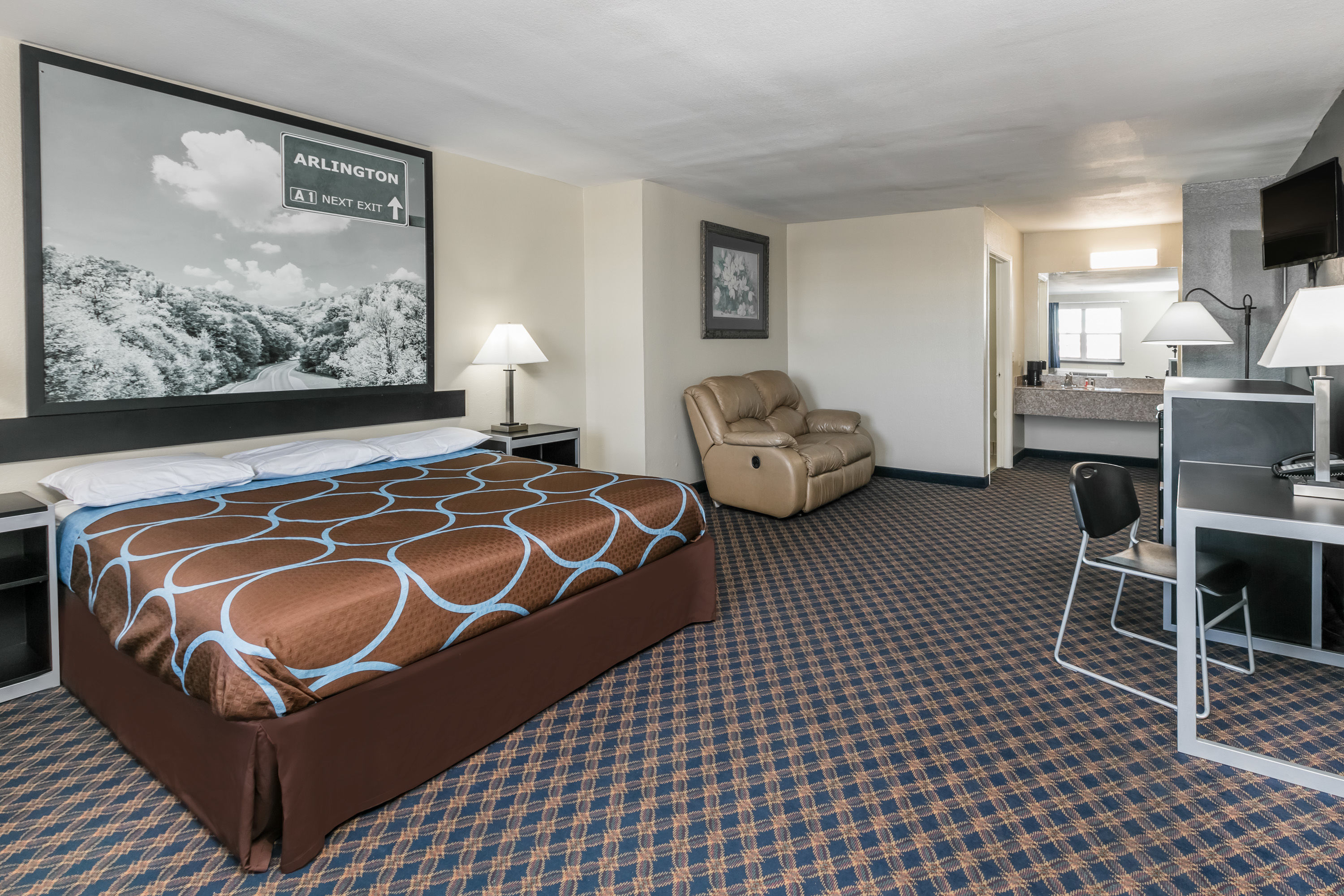 Guest room at the Super 8 by Wyndham Arlington Near AT&T Stadium in Arlington, Texas