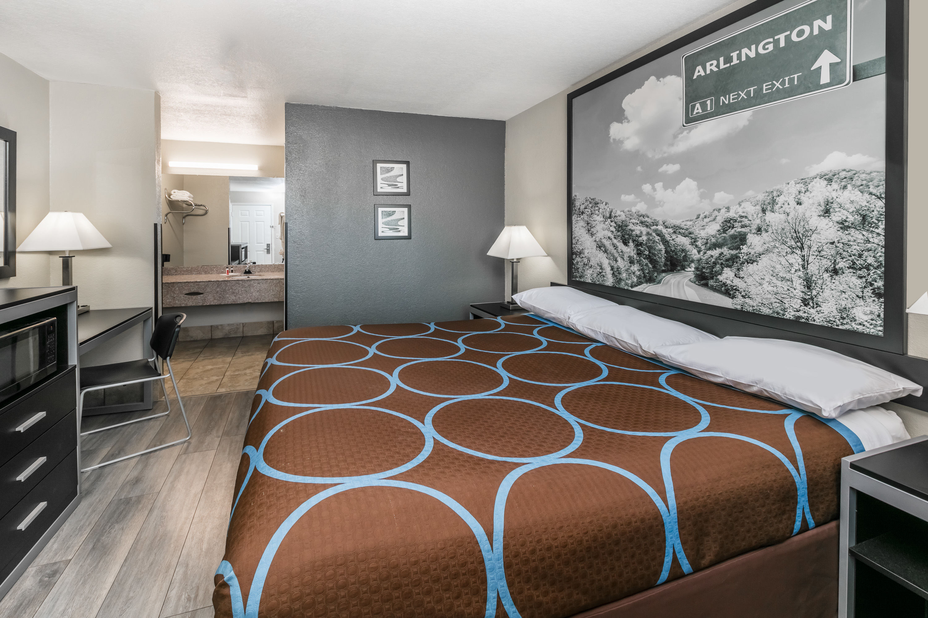 Guest room at the Super 8 by Wyndham Arlington Near AT&T Stadium in Arlington, Texas