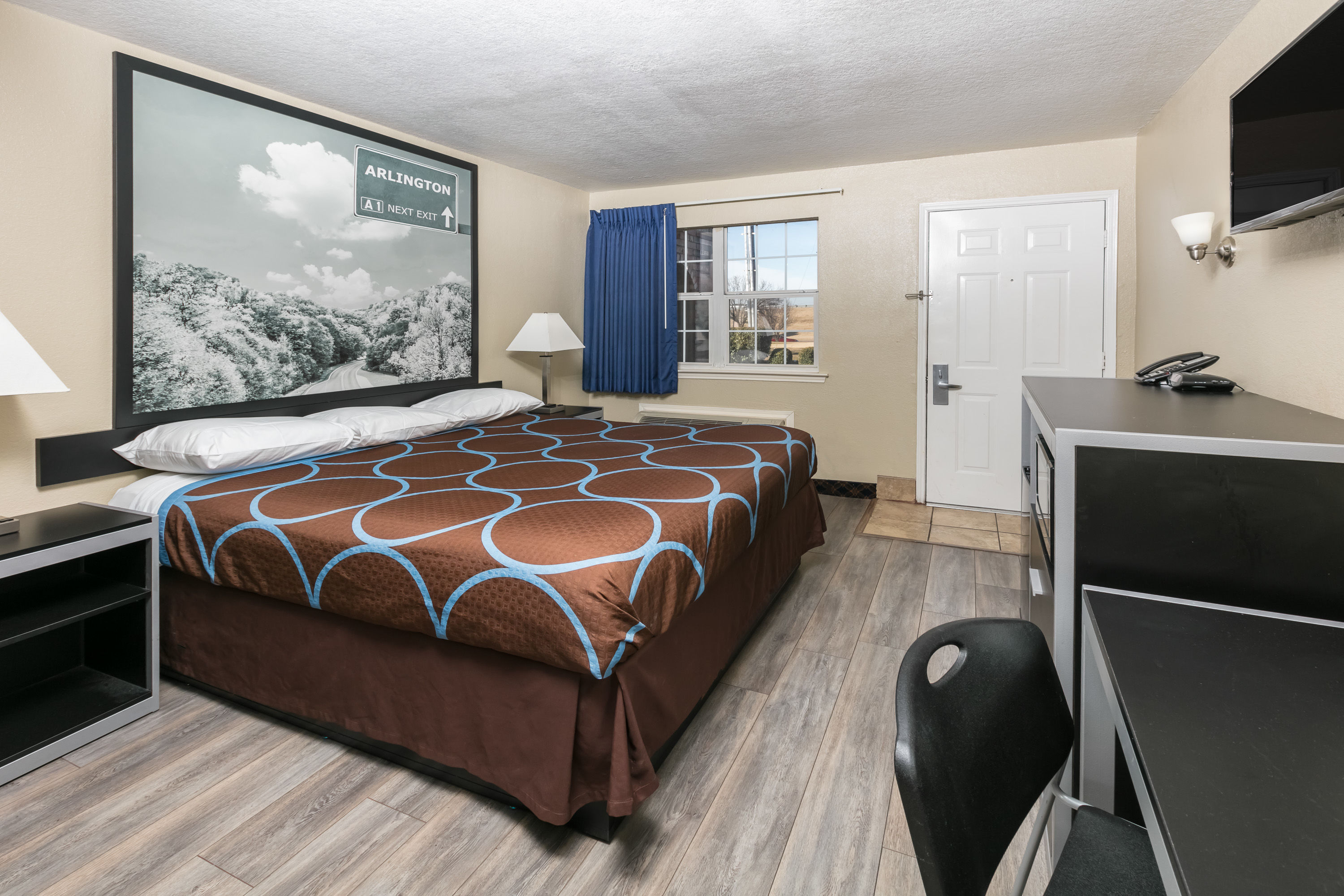 Guest room at the Super 8 by Wyndham Arlington Near AT&T Stadium in Arlington, Texas