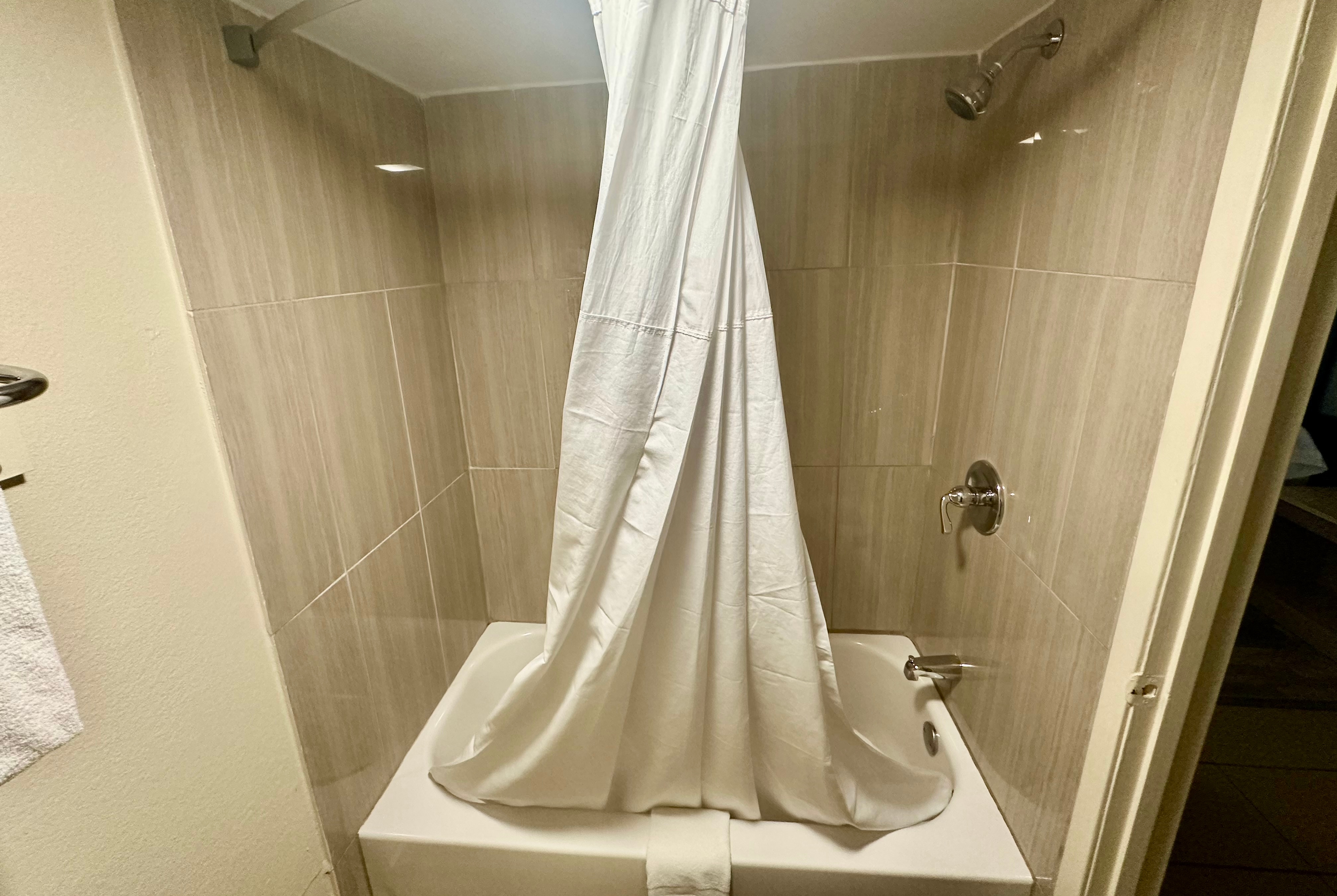 Guest room bath at the Super 8 by Wyndham Athens TX in Athens, Texas
