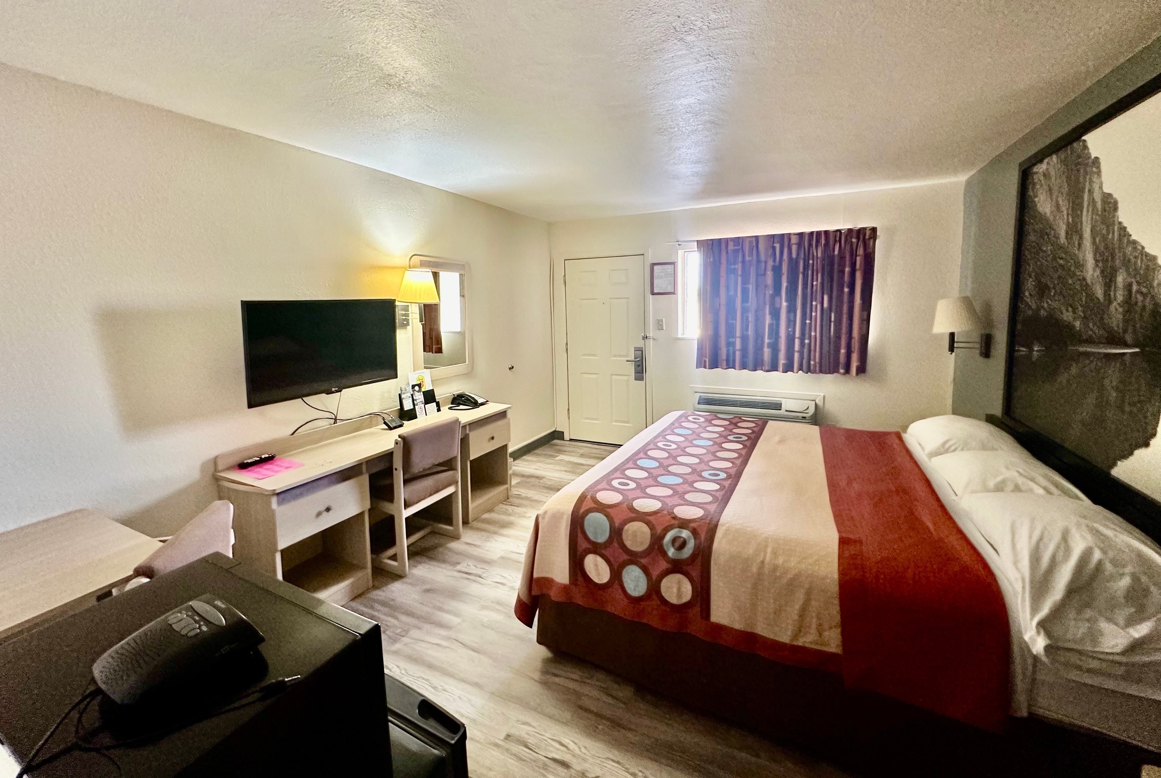 Guest room at the Super 8 by Wyndham Athens TX in Athens, Texas