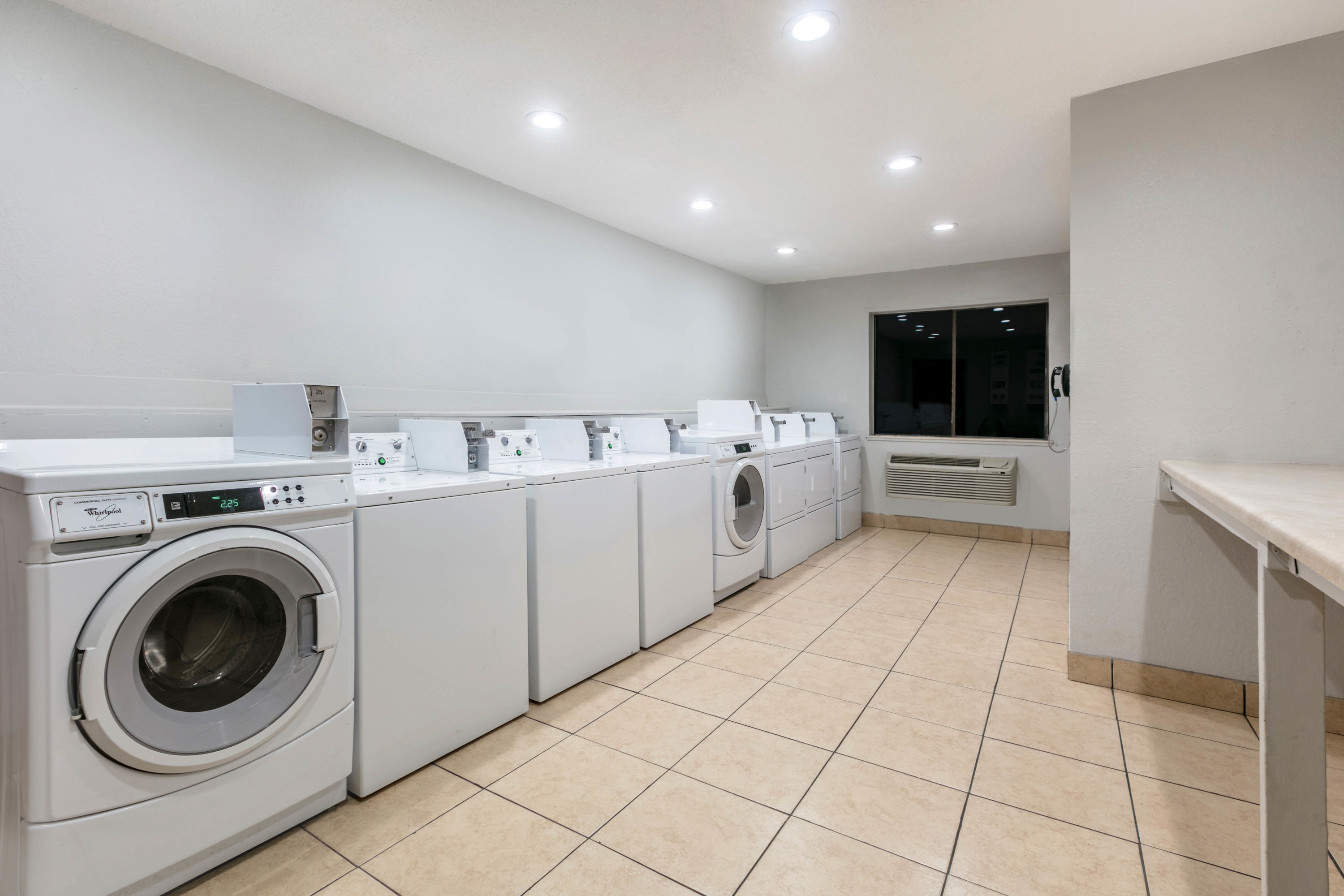 Laundry facilities at Super 8 by Wyndham Austin University/Downtown Area in Austin, Texas