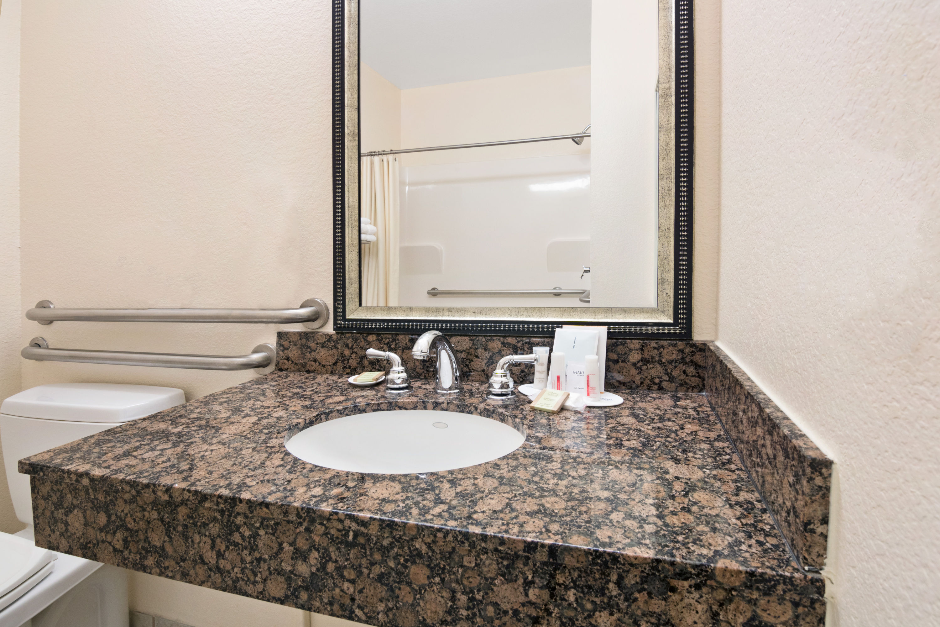 Guest room at the Super 8 by Wyndham Austin/Airport South in Austin, Texas