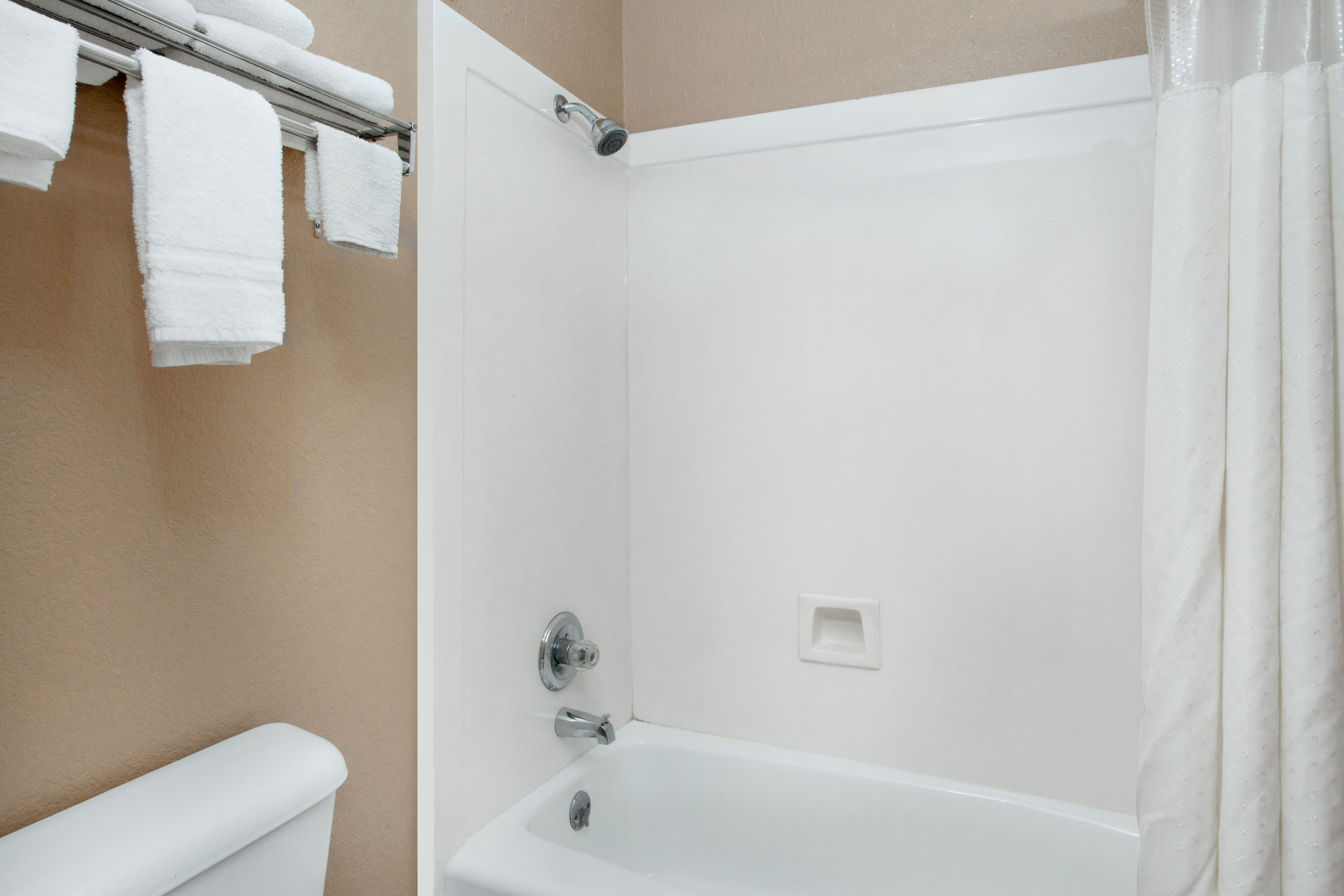 Guest room bath at the Super 8 by Wyndham Bastrop TX in Bastrop, Texas