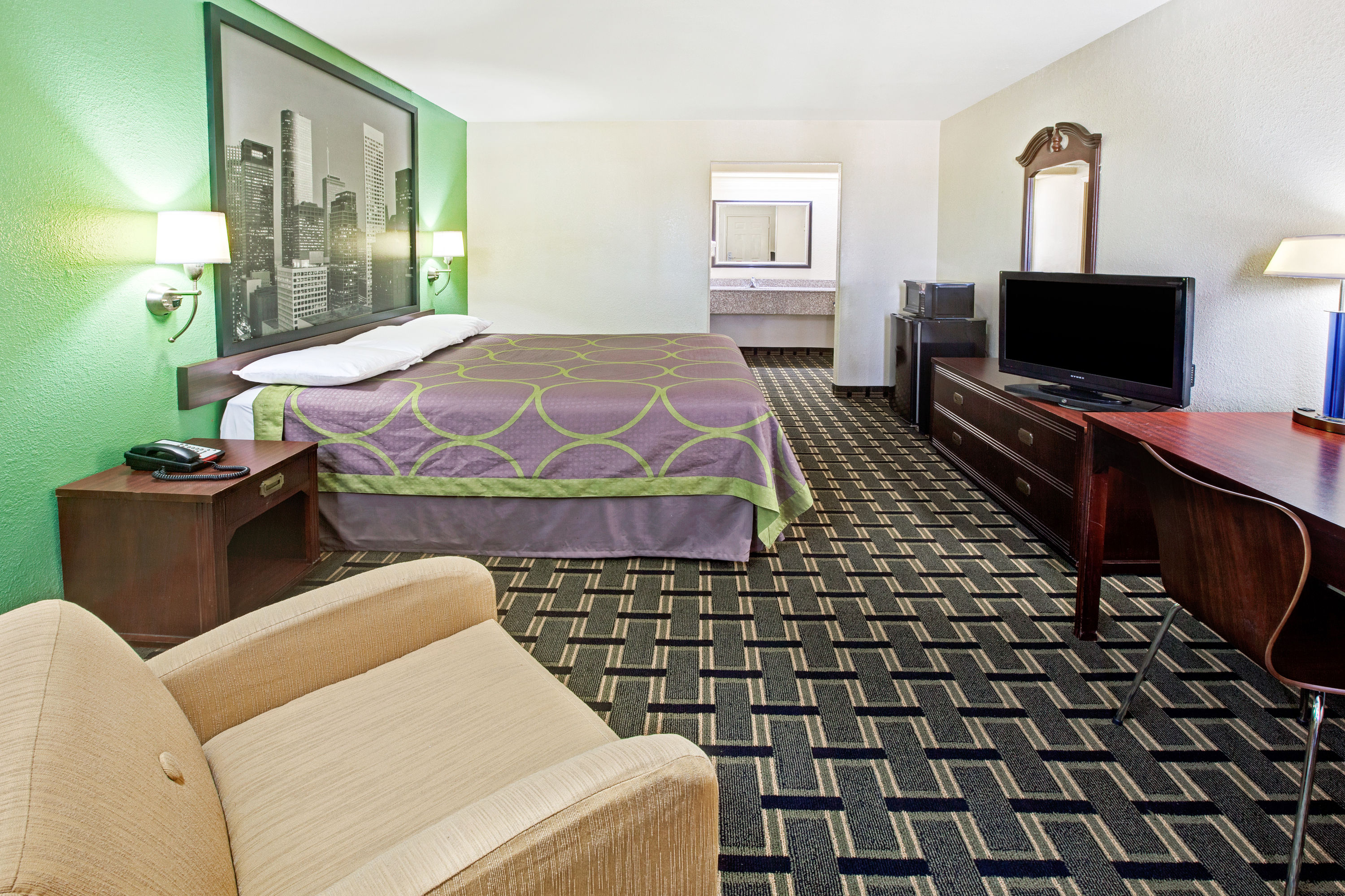 Guest room at the Super 8 by Wyndham Baytown / I-10 in Baytown, Texas