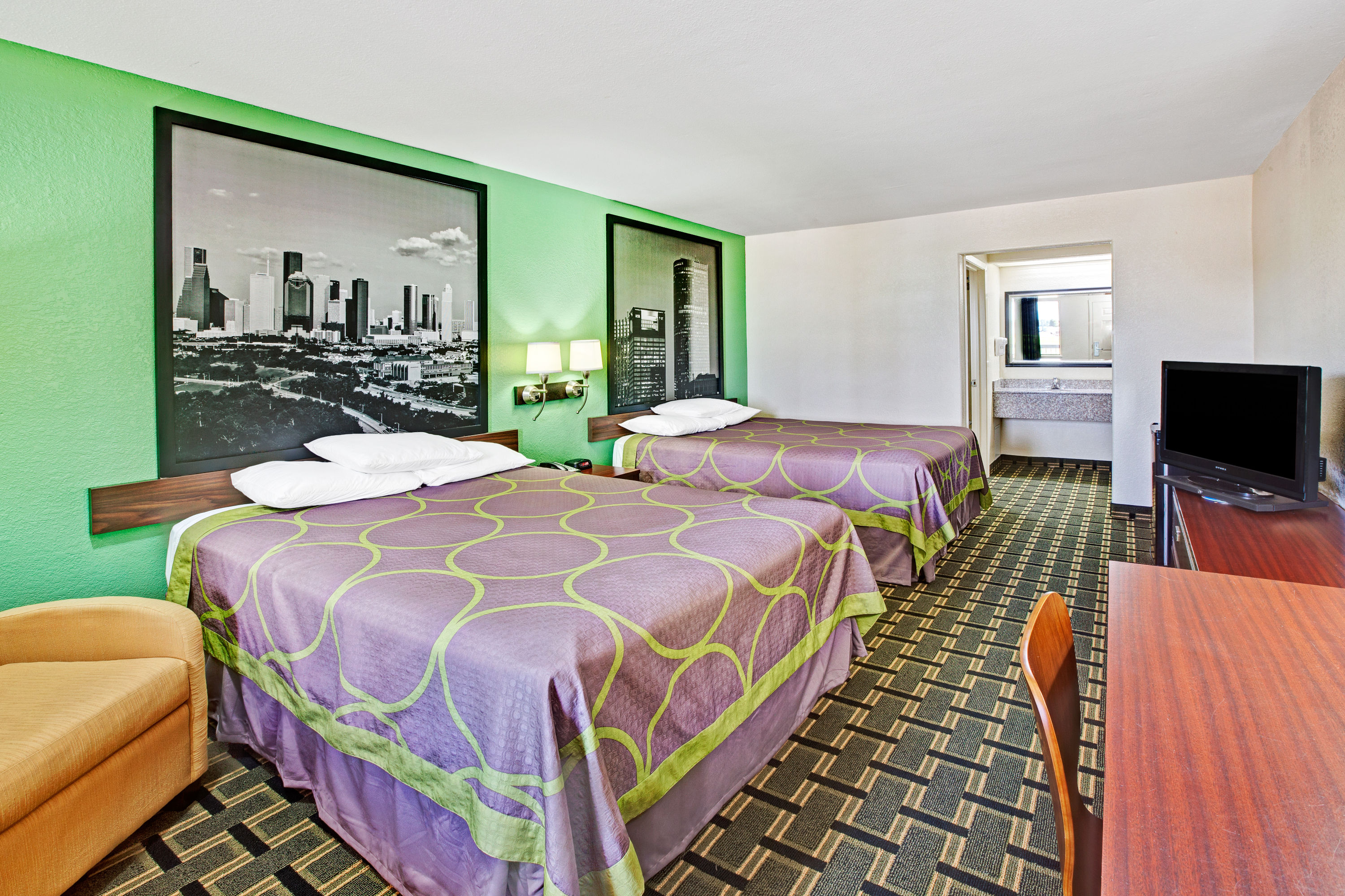 Guest room at the Super 8 by Wyndham Baytown / I-10 in Baytown, Texas