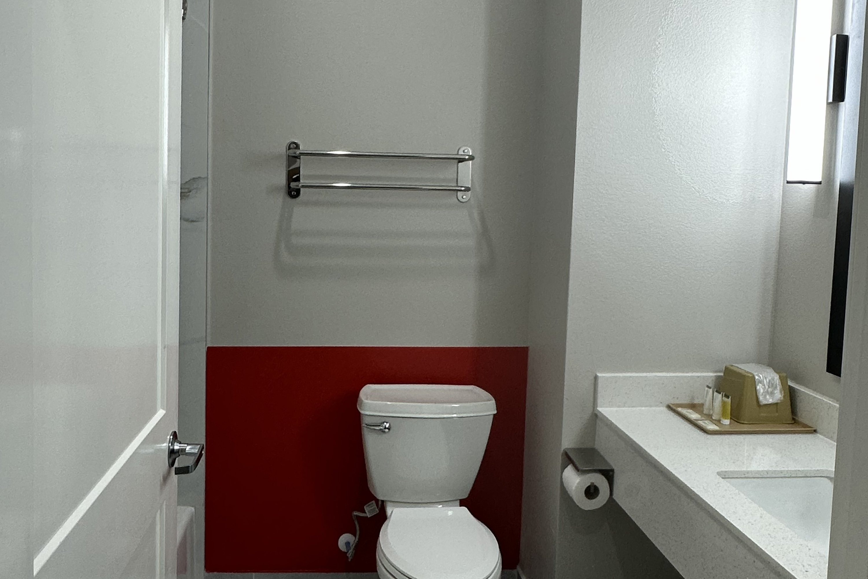 Guest room bath at the Super 8 by Wyndham Baytown in Baytown, Texas