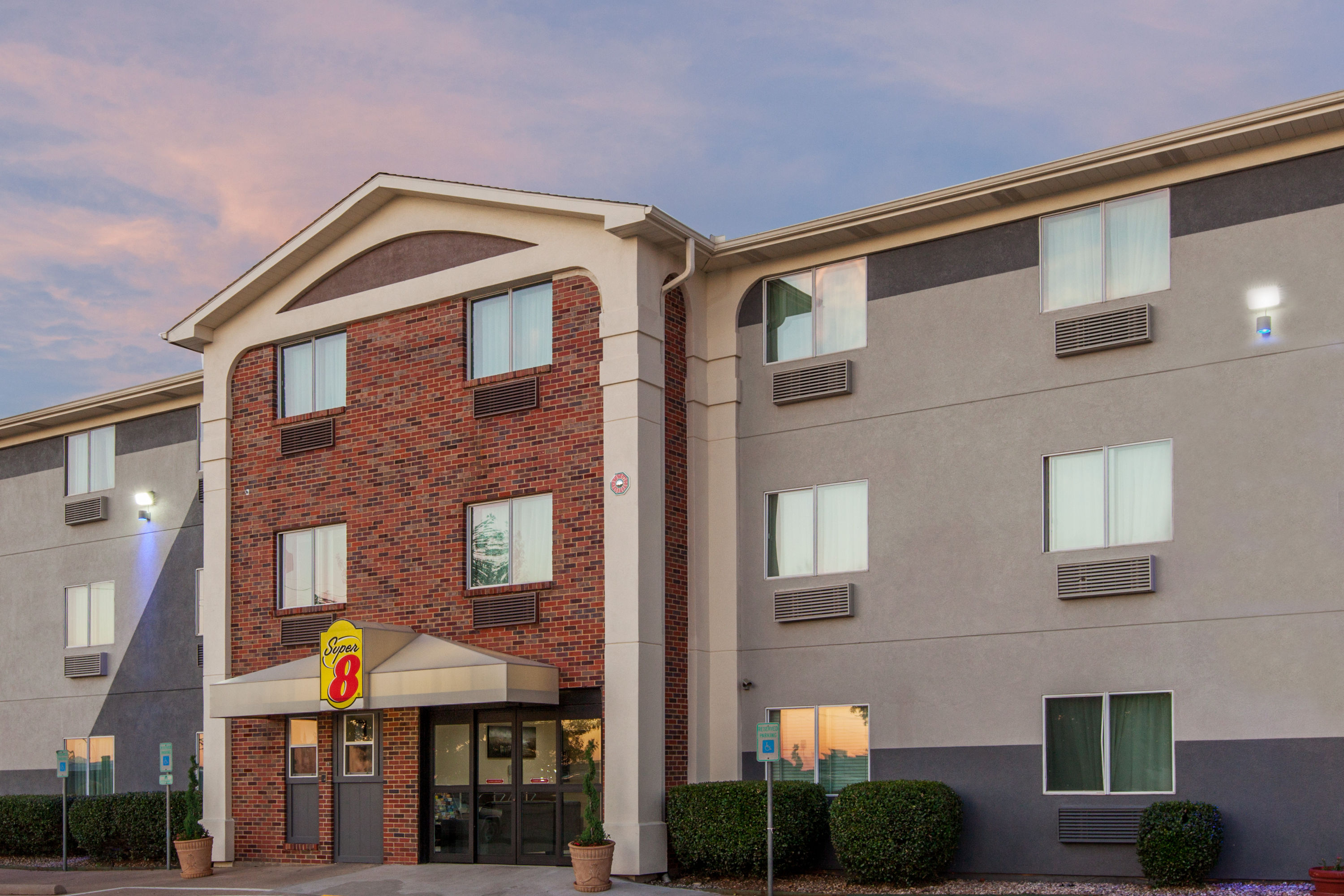 Exterior Dusk Image of Super 8 by Wyndham Bedford DFW Airport West hotel in Bedford, Texas