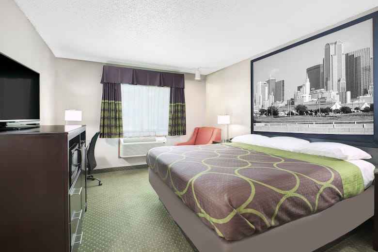 Guest room at the Super 8 Bedford DFW Airport West in Bedford, Texas