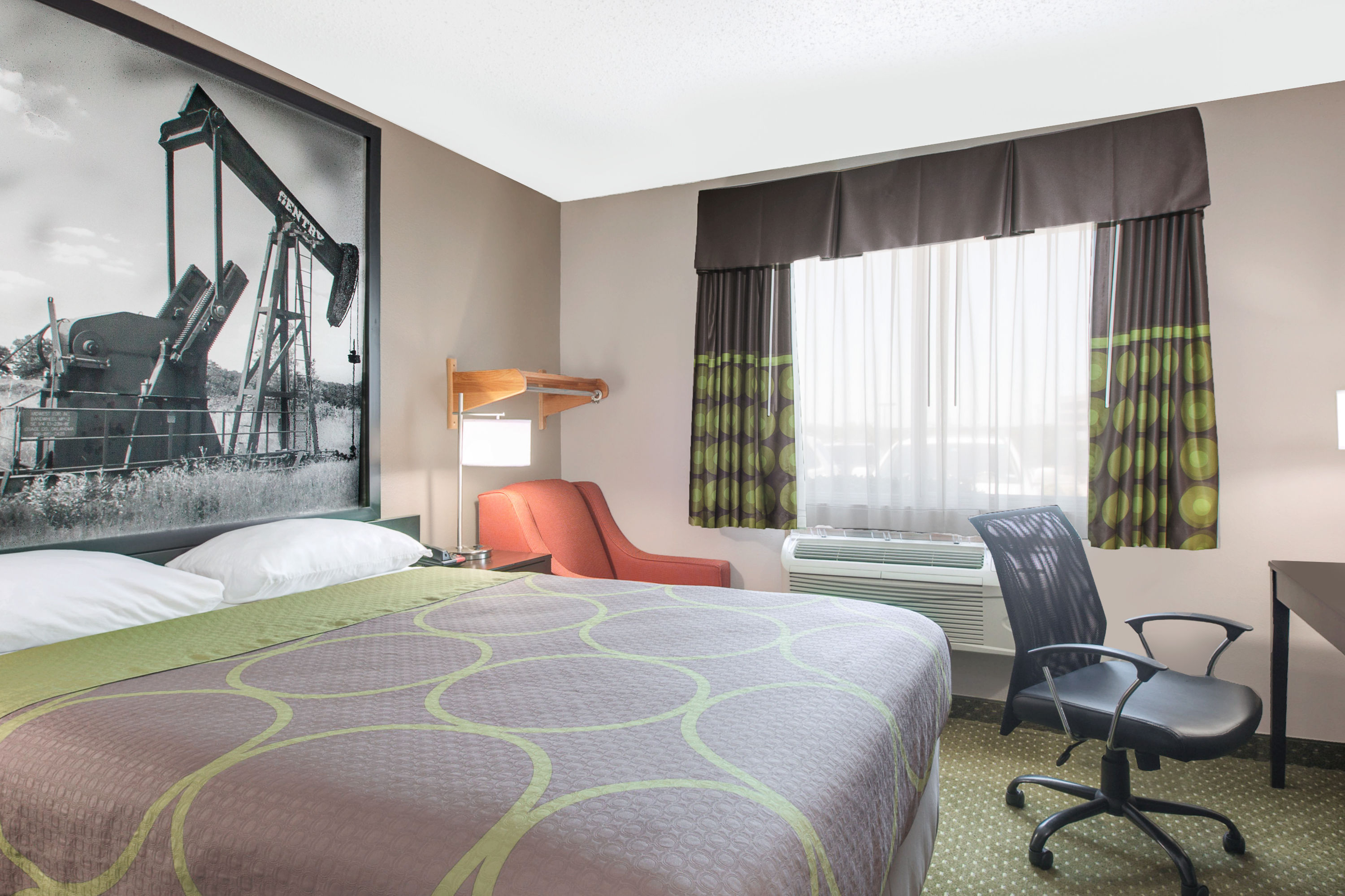 Guest room at the Super 8 by Wyndham Bedford DFW Airport West in Bedford, Texas