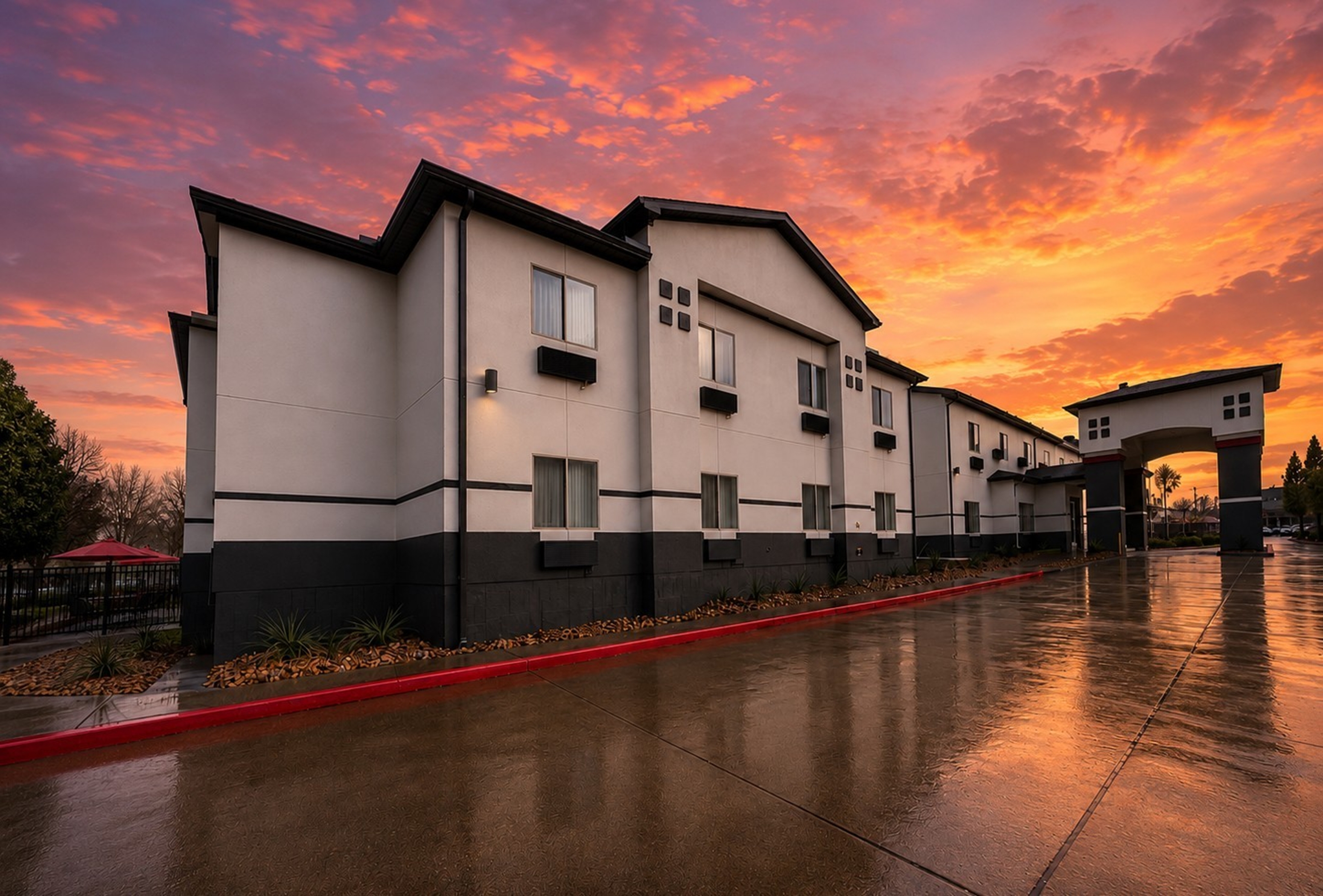 Exterior Dusk Image of Super 8 by Wyndham Brenham TX hotel in Brenham, Texas