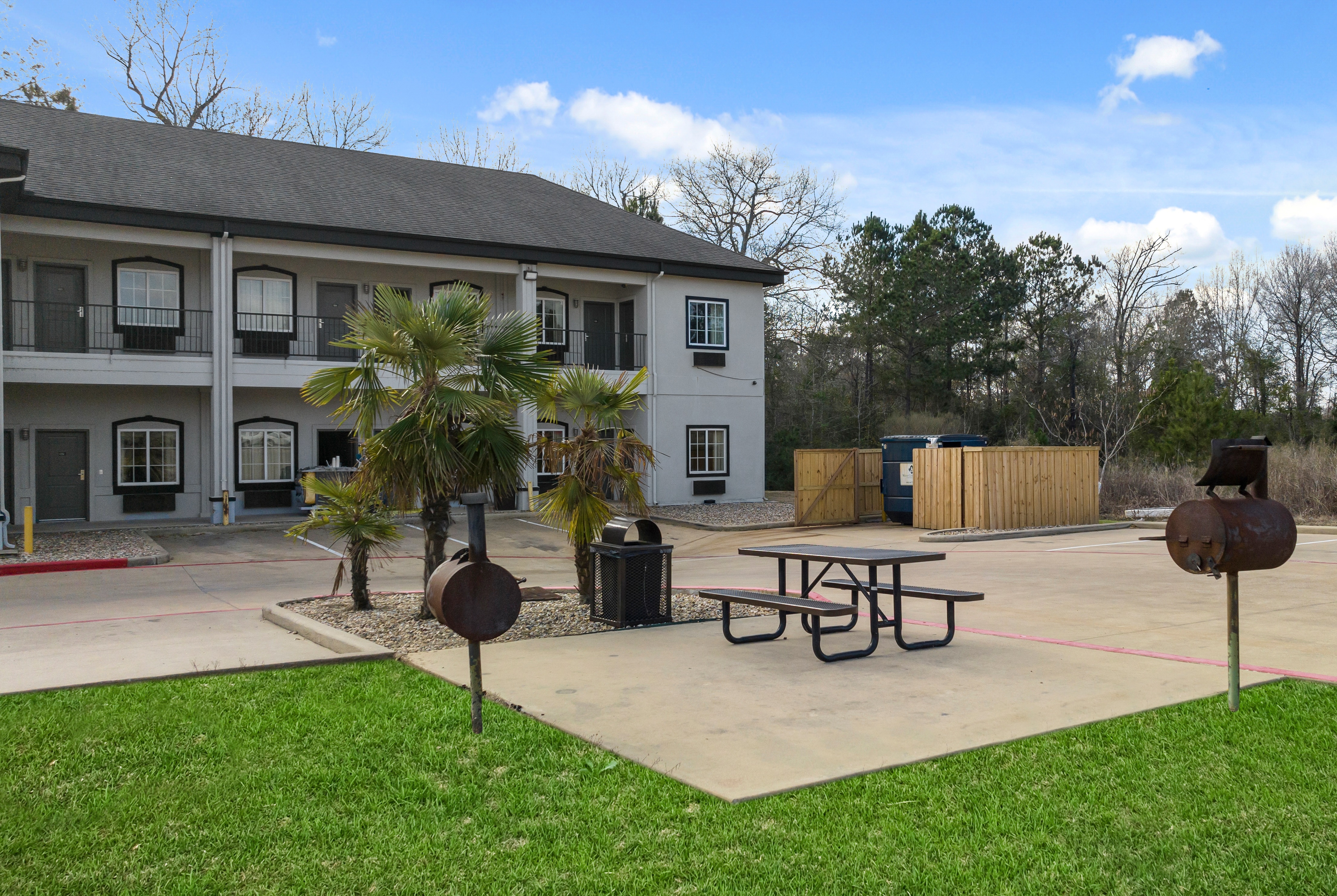 Exterior of Super 8 by Wyndham Carthage TX hotel in Carthage, Texas