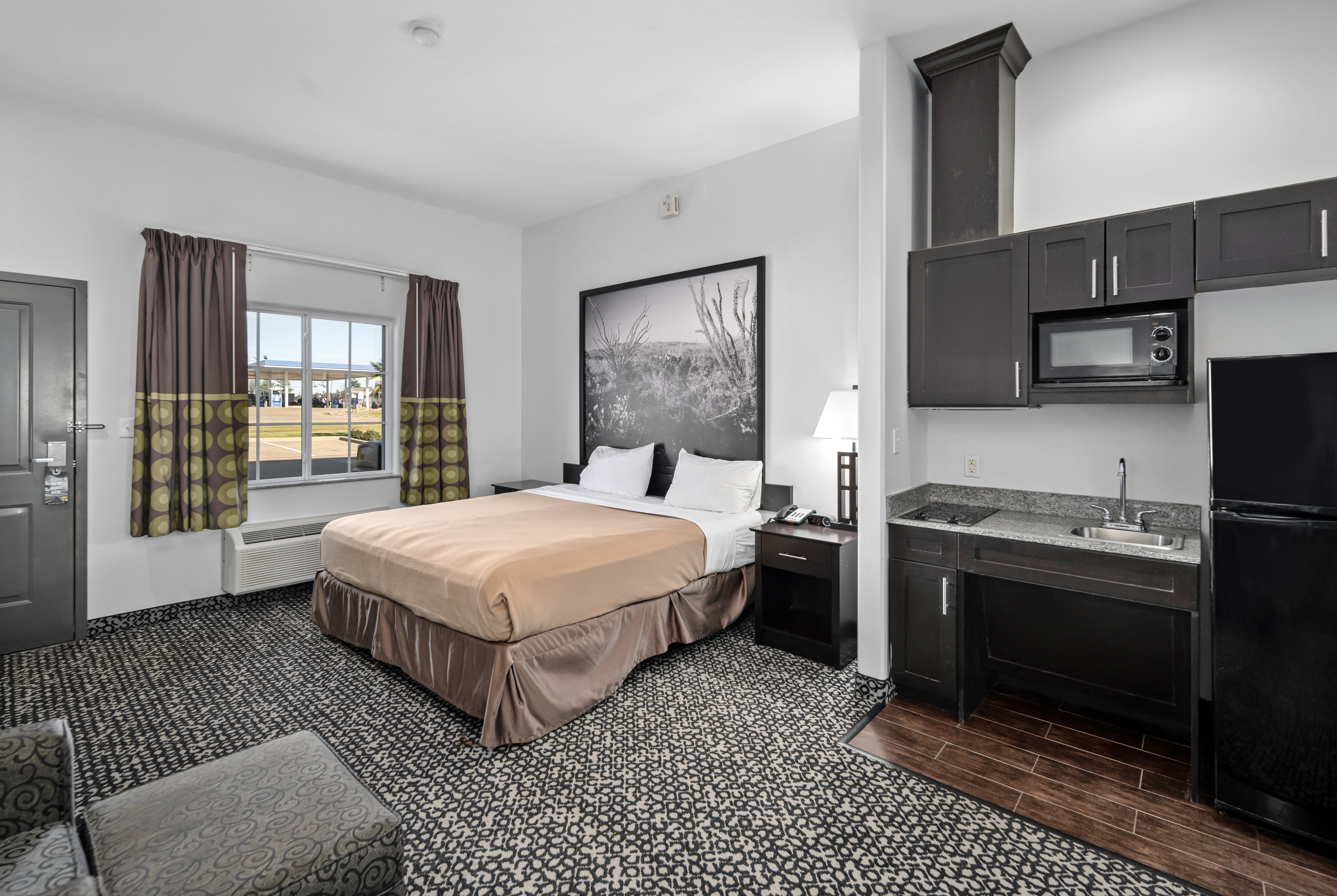 Guest room at the Super 8 by Wyndham Carthage TX in Carthage, Texas