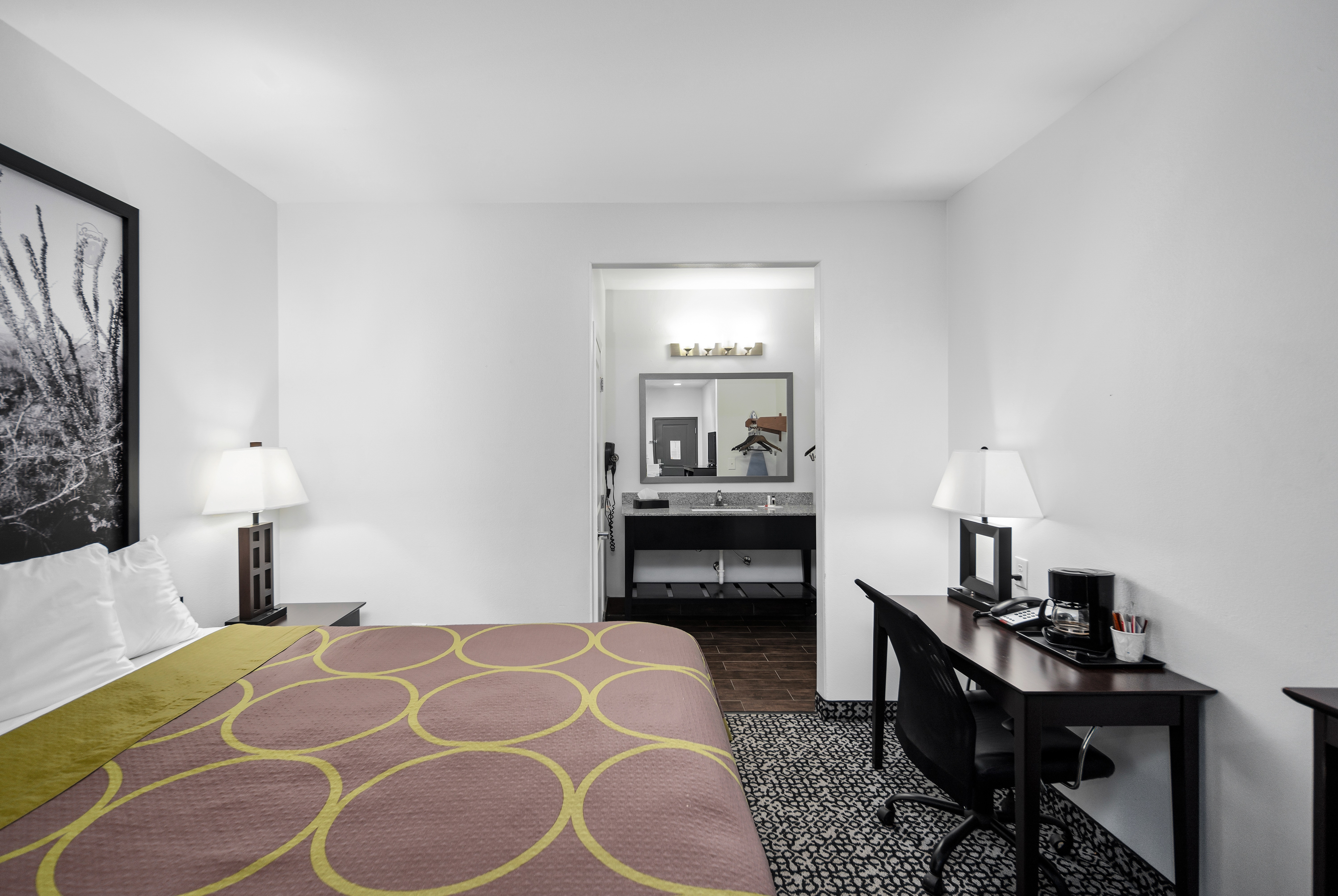 Guest room at the Super 8 by Wyndham Carthage TX in Carthage, Texas