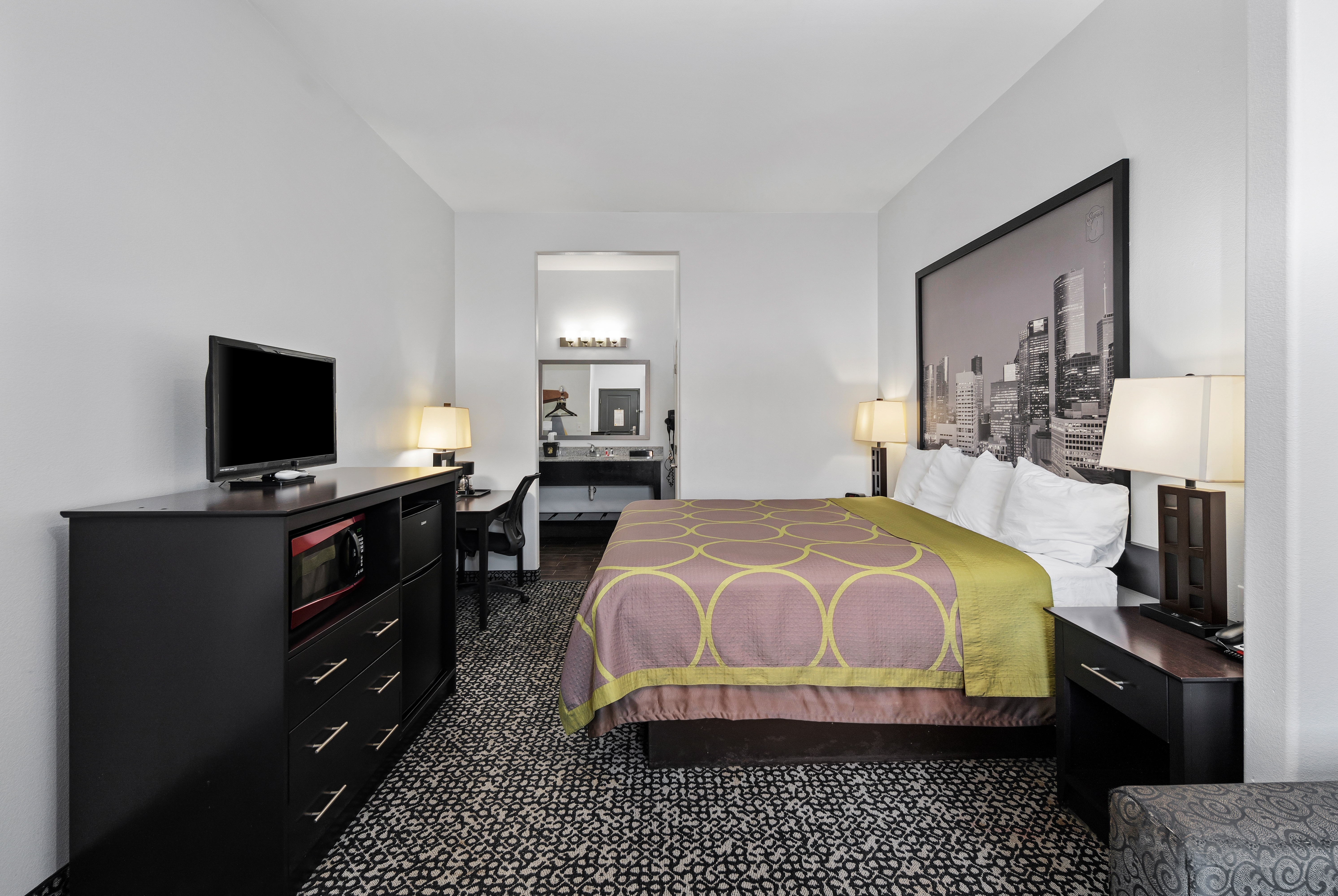 Guest room at the Super 8 by Wyndham Carthage TX in Carthage, Texas