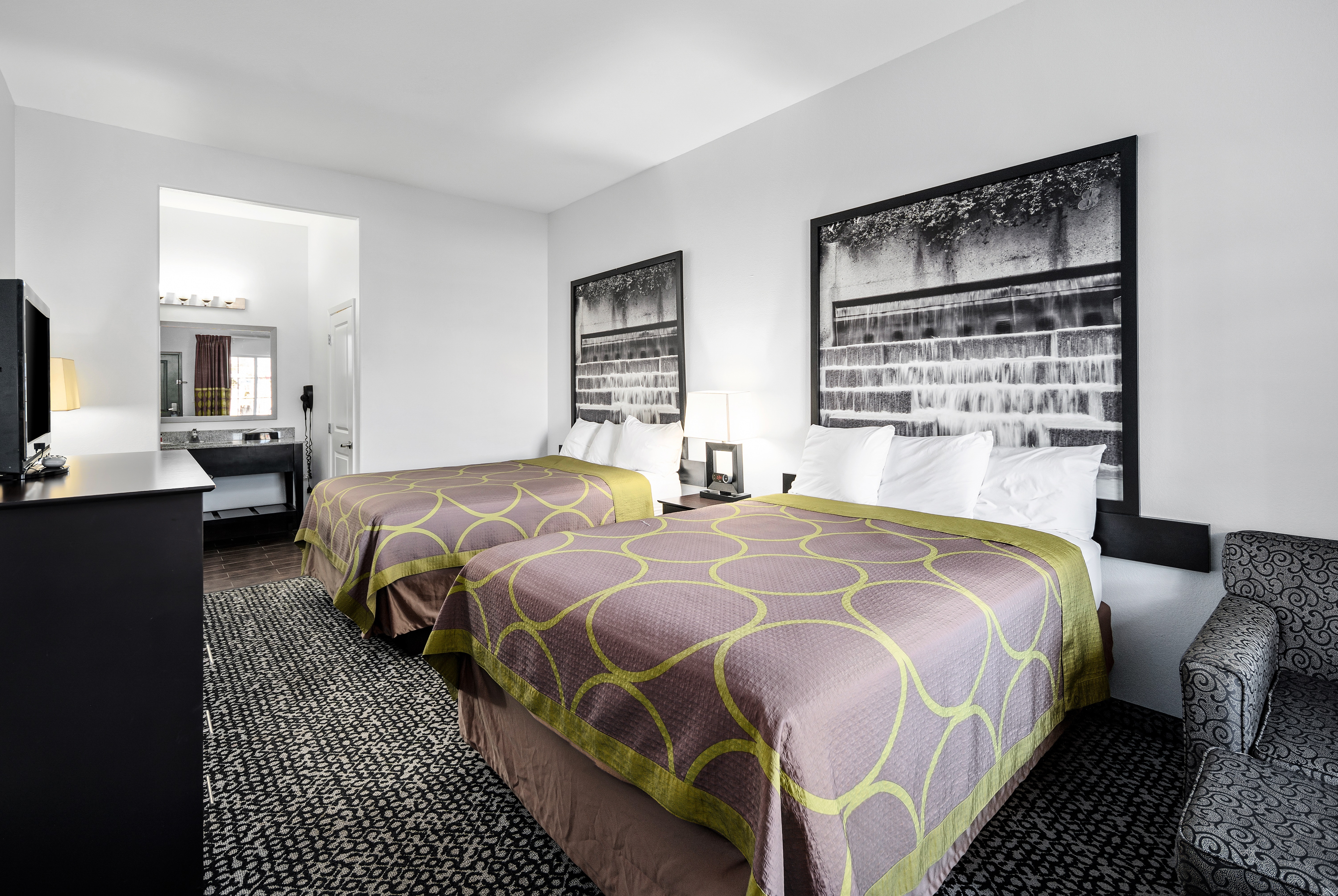 Guest room at the Super 8 by Wyndham Carthage TX in Carthage, Texas