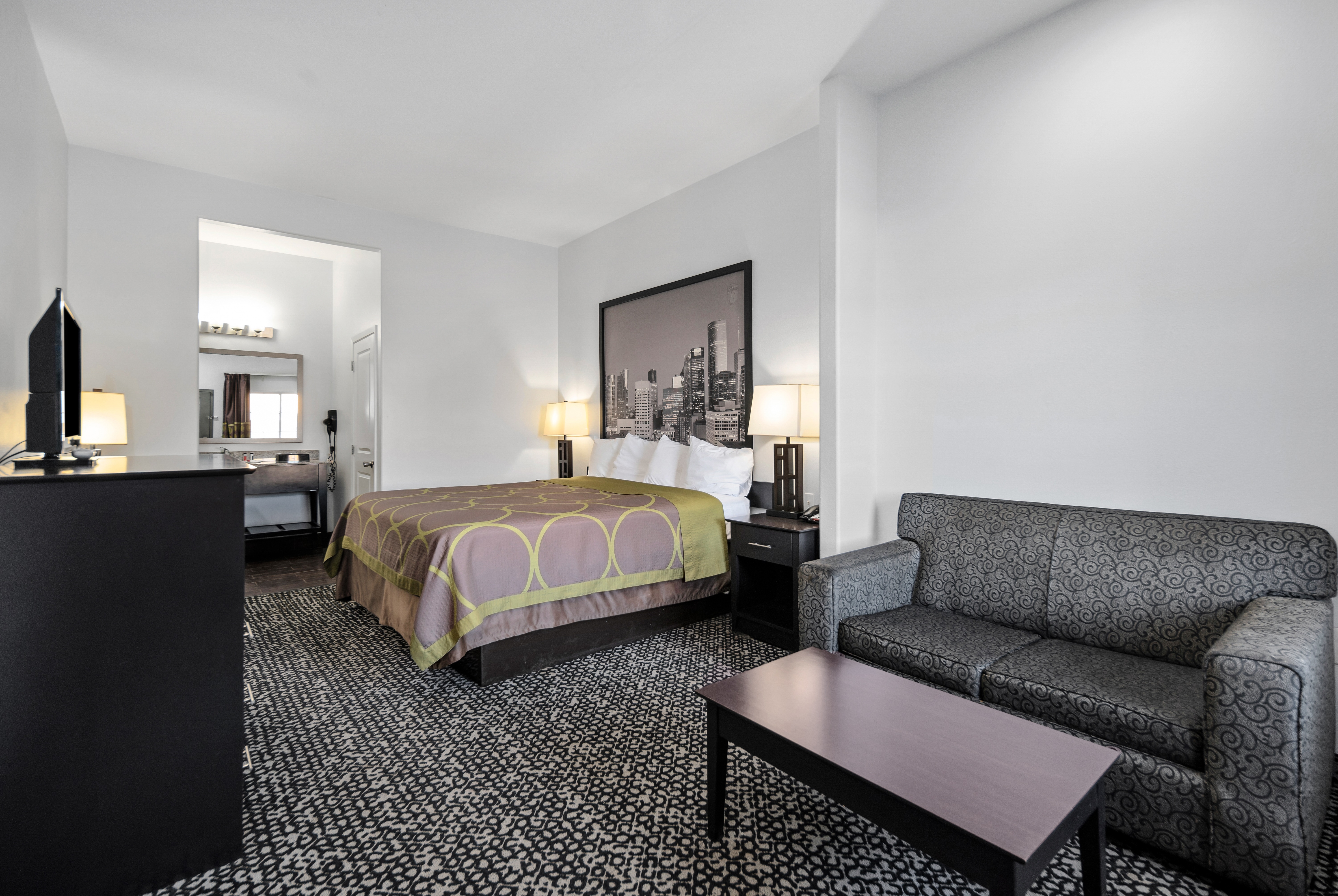 Guest room at the Super 8 by Wyndham Carthage TX in Carthage, Texas