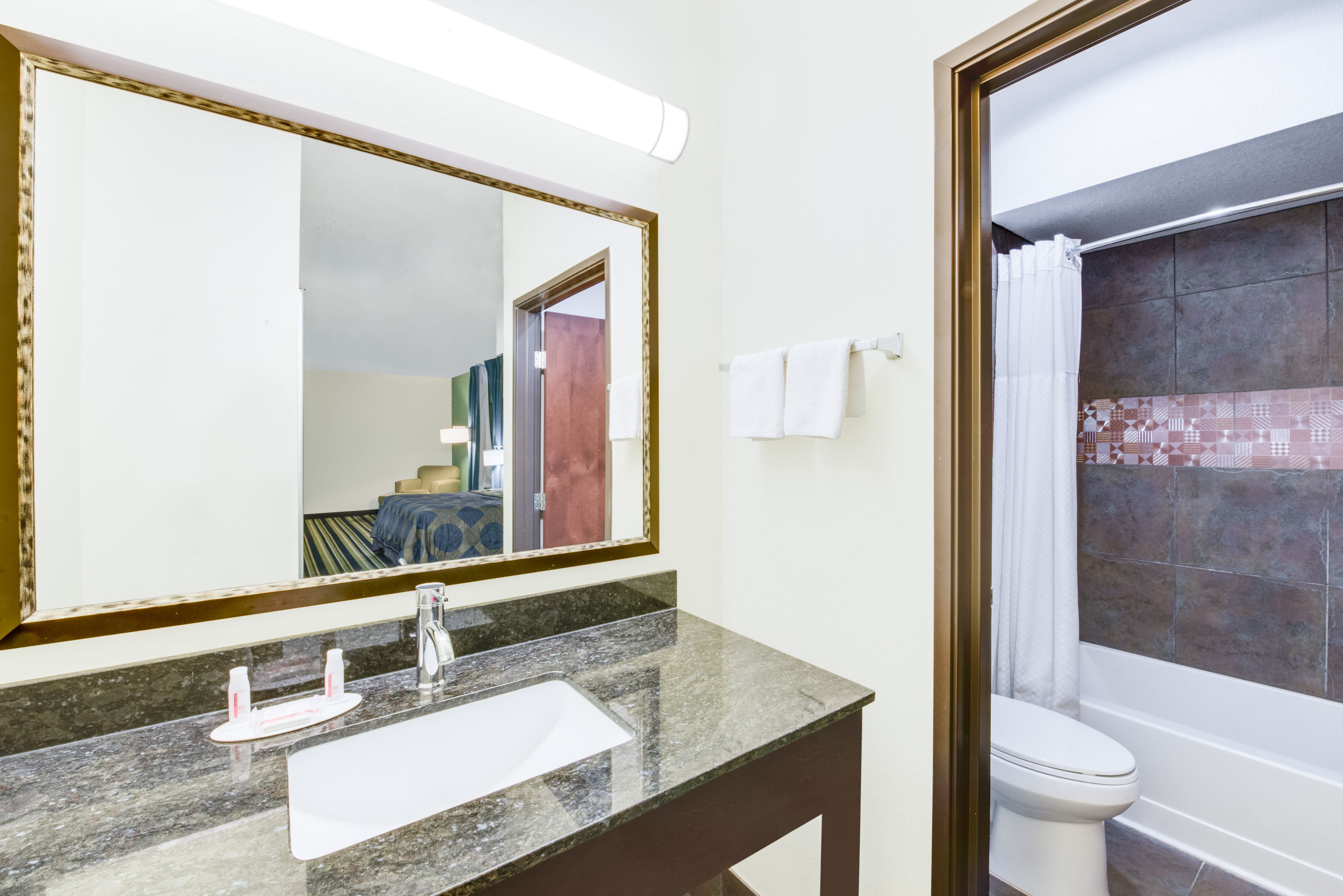 Guest room bath at the Super 8 by Wyndham Cotulla TX in Cotulla, Texas