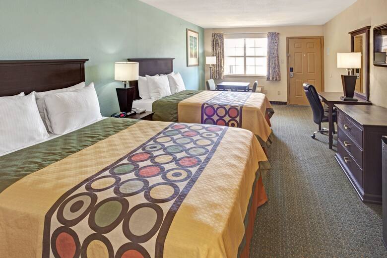 Guest room at the Super 8 Dallas East in Dallas, Texas