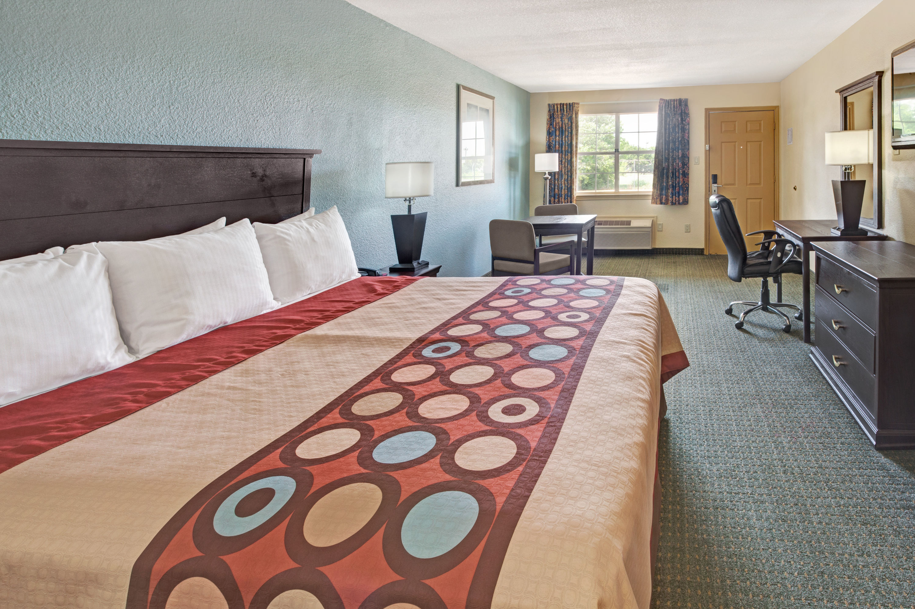 Guest room at the Super 8 by Wyndham Dallas East Near Fair Park/Downtown in Dallas, Texas