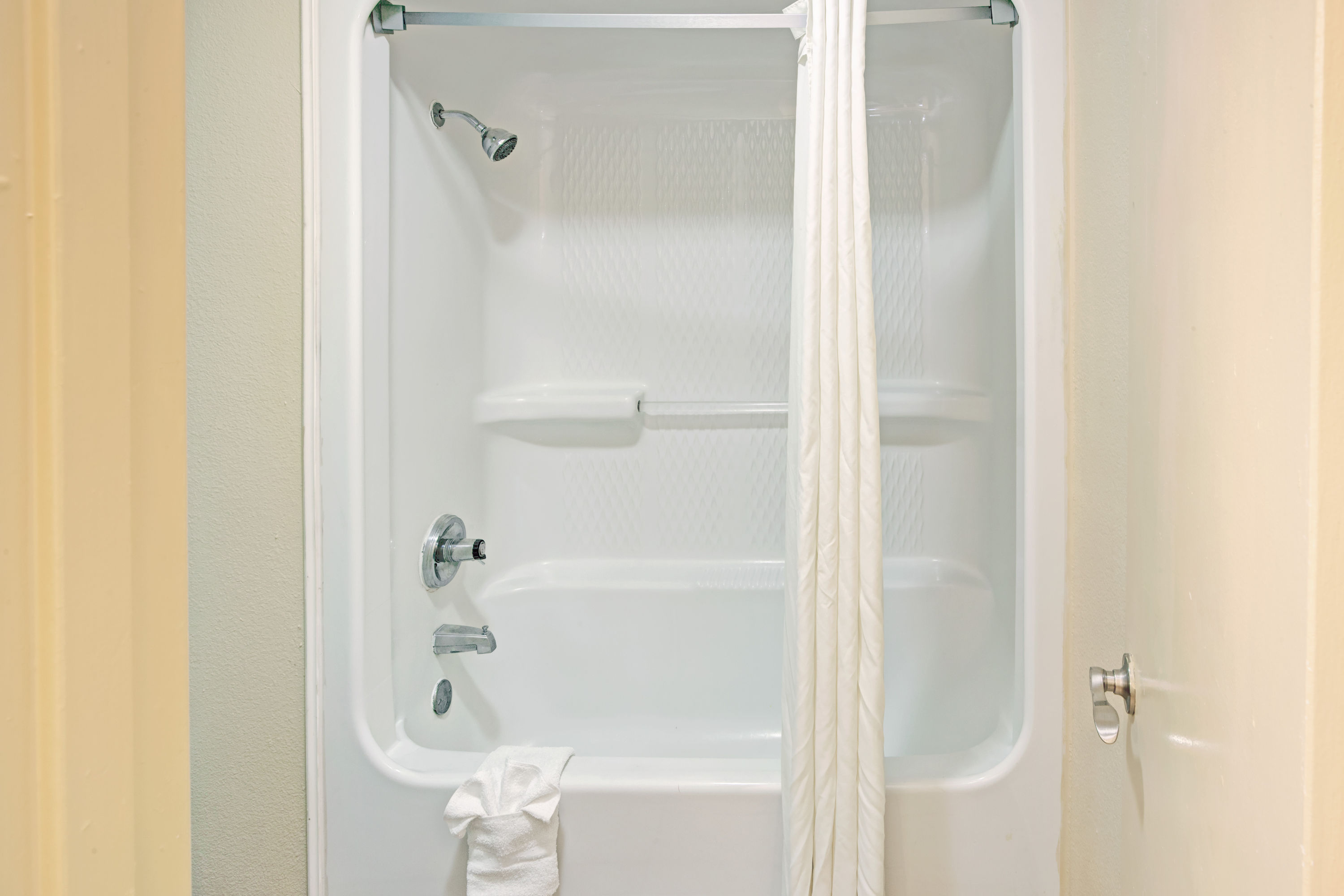 Guest room at the Super 8 by Wyndham Dallas East Near Fair Park/Downtown in Dallas, Texas