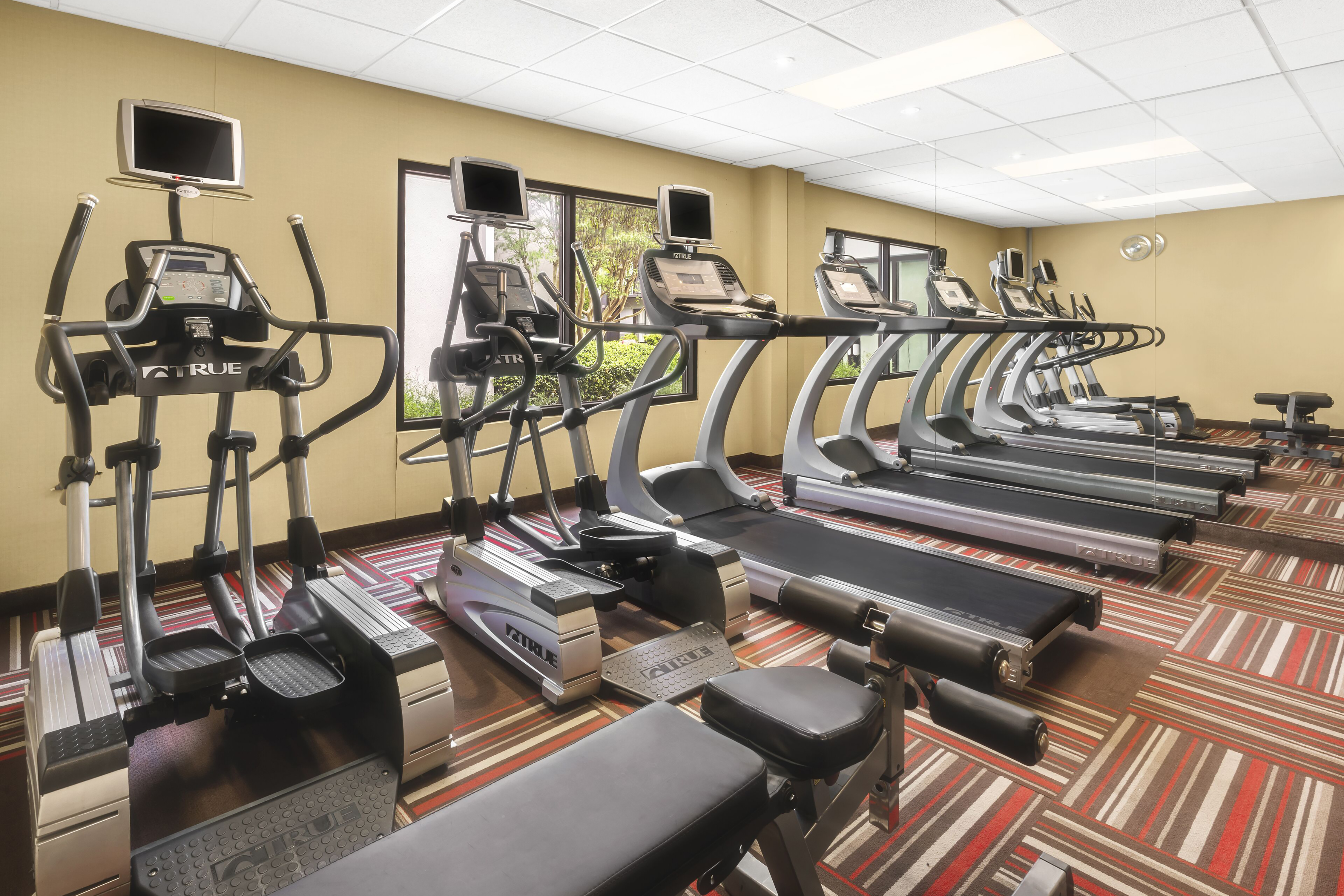 Fitness room at Super 8 by Wyndham Dallas Love Field Airport in Dallas, Texas