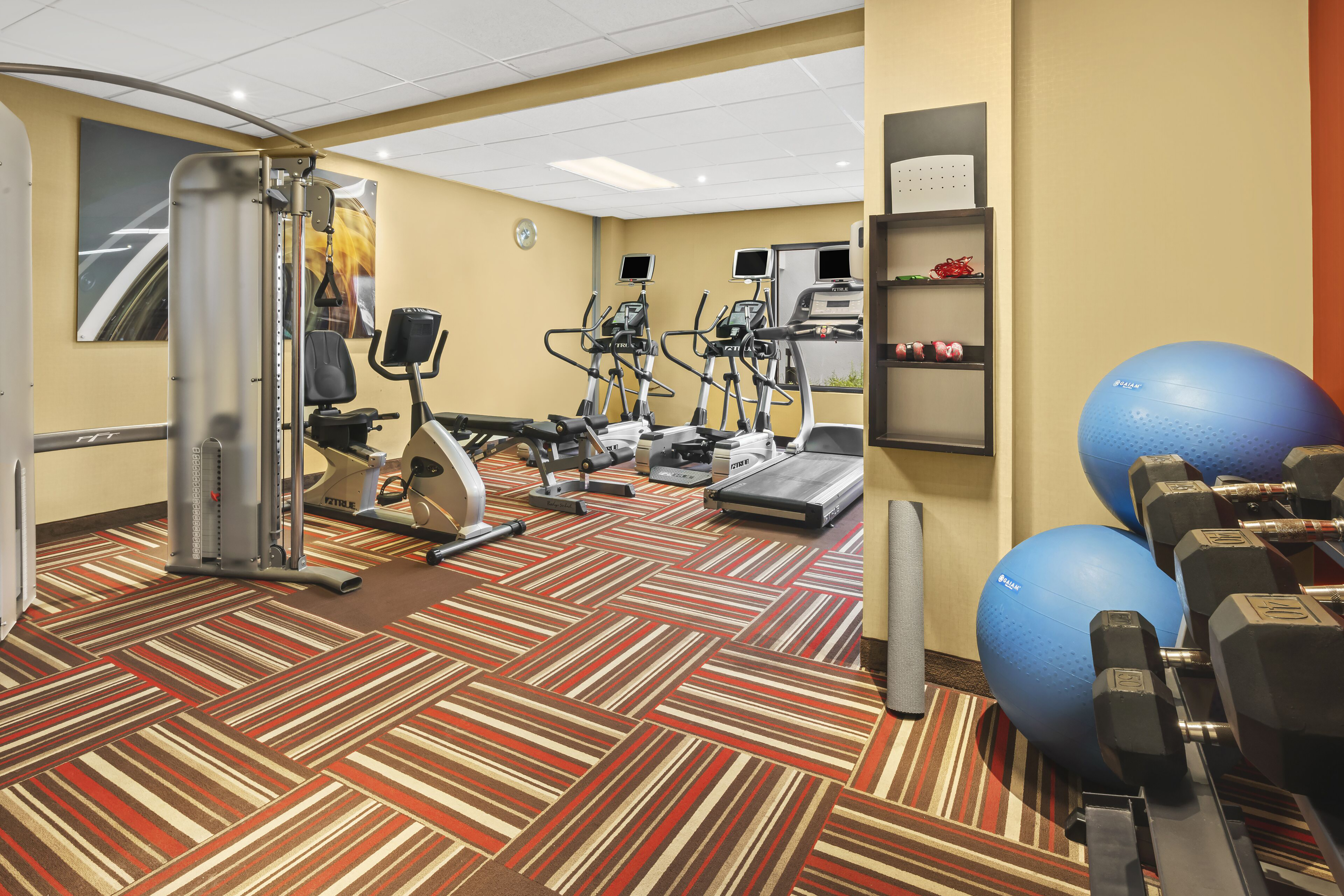 Fitness room at Super 8 by Wyndham Dallas Love Field Airport in Dallas, Texas
