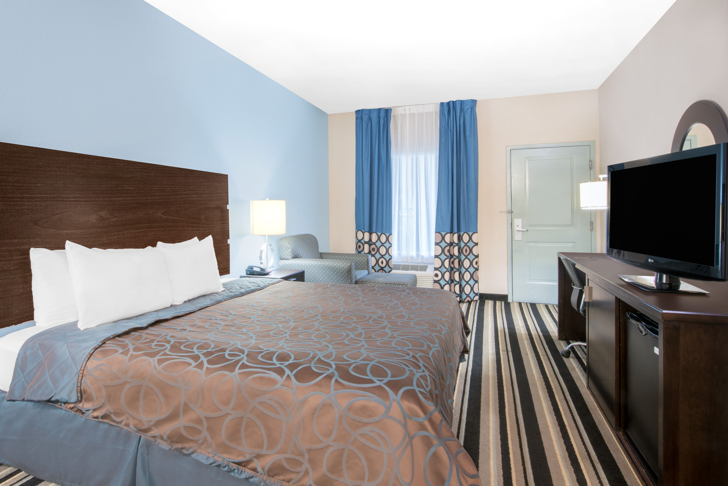 Guest room at the Super 8 by Wyndham Dilley TX in Dilley, Texas