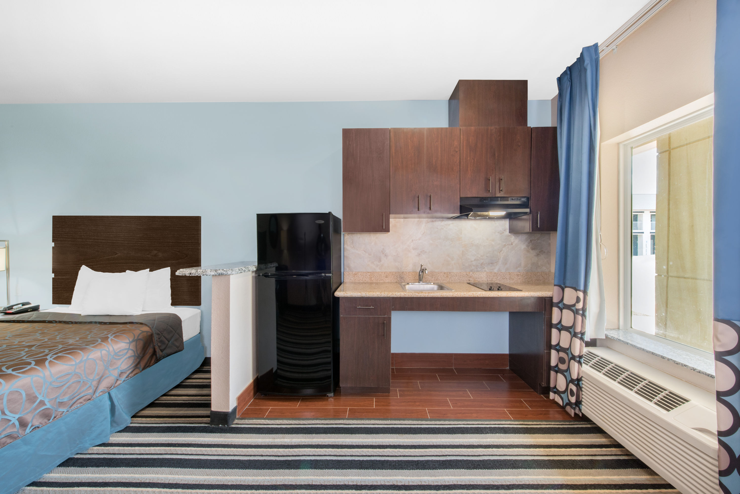 Super 8 by Wyndham Dilley TX suite kitchen in Dilley, Texas