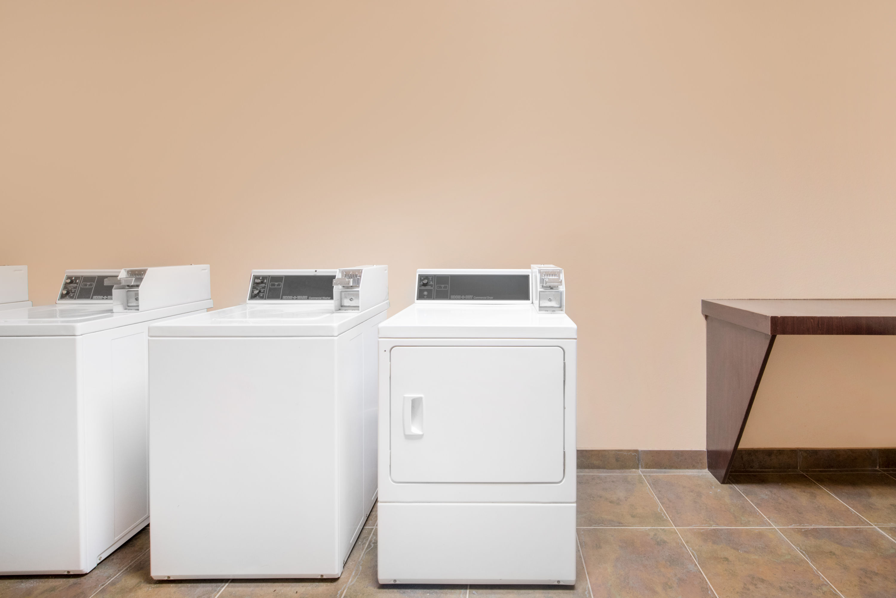 Laundry facilities at Super 8 by Wyndham Dilley TX in Dilley, Texas