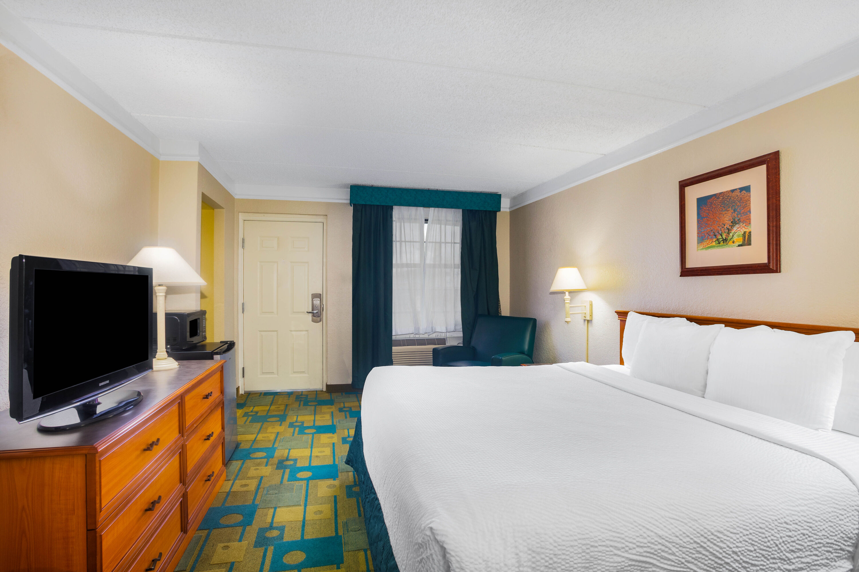Guest room at the Super 8 by Wyndham Eagle Pass in Eagle Pass, Texas