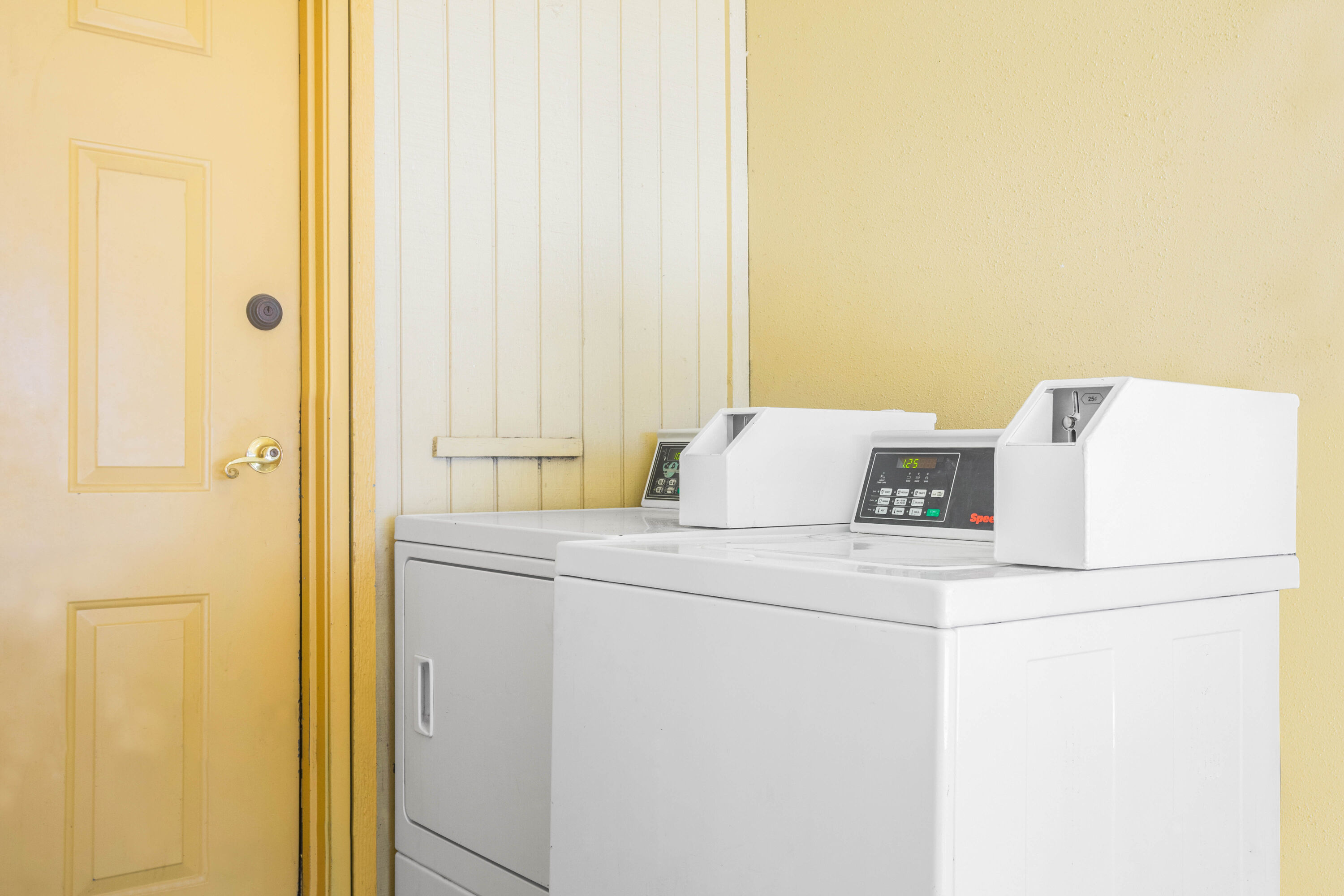 Laundry facilities at Super 8 by Wyndham Eagle Pass in Eagle Pass, Texas