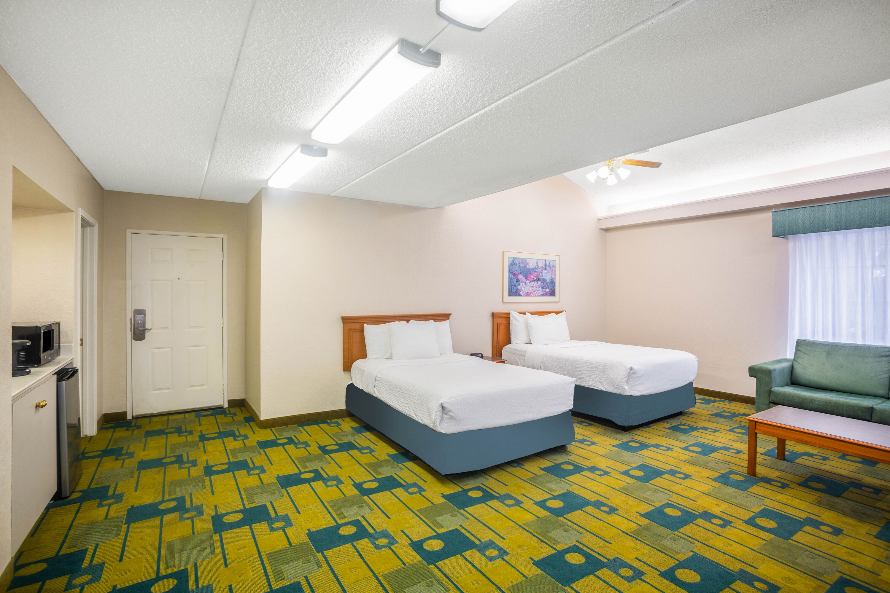 Super 8 by Wyndham Eagle Pass suite in Eagle Pass, Texas