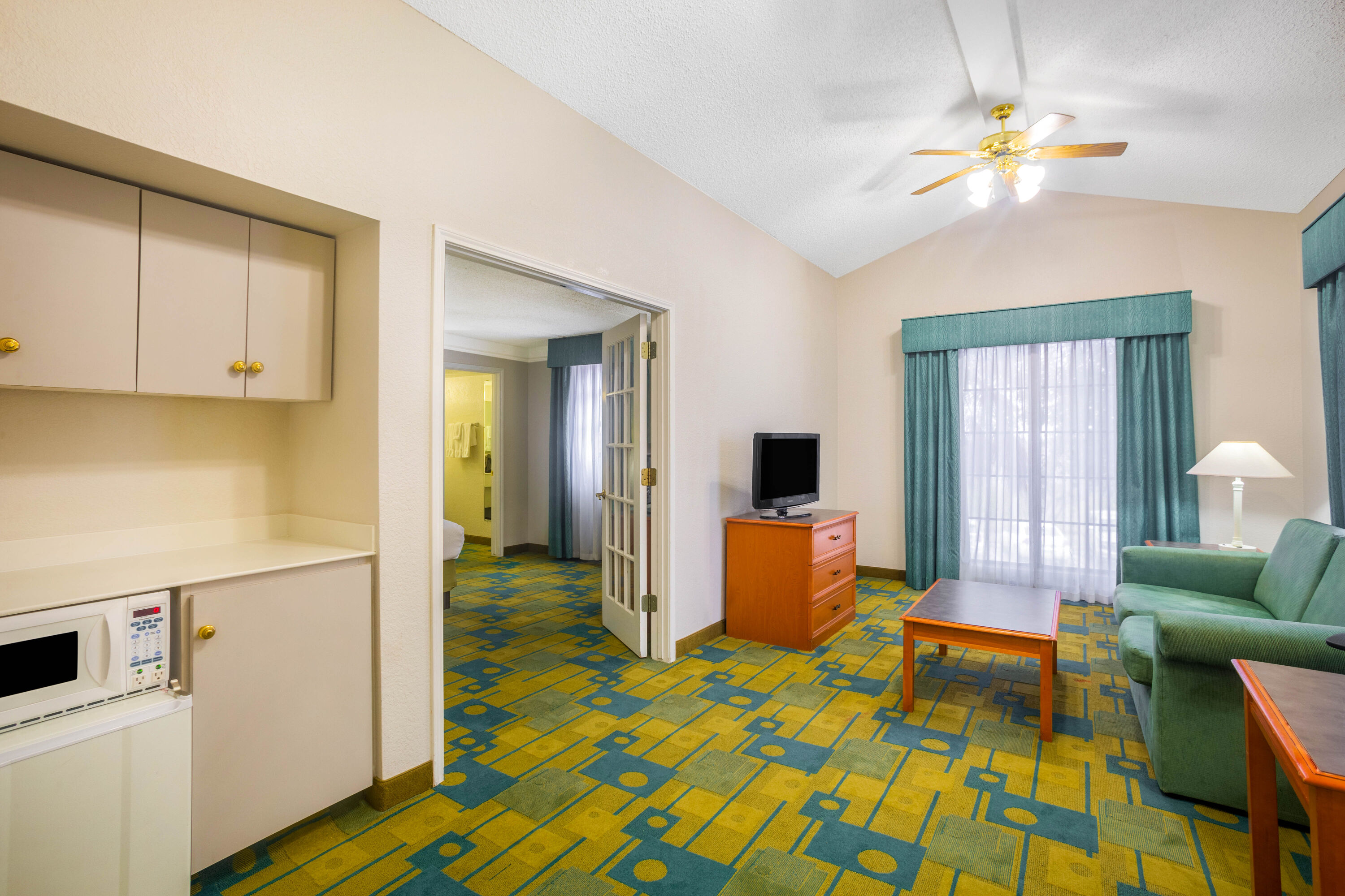 Super 8 by Wyndham Eagle Pass suite in Eagle Pass, Texas