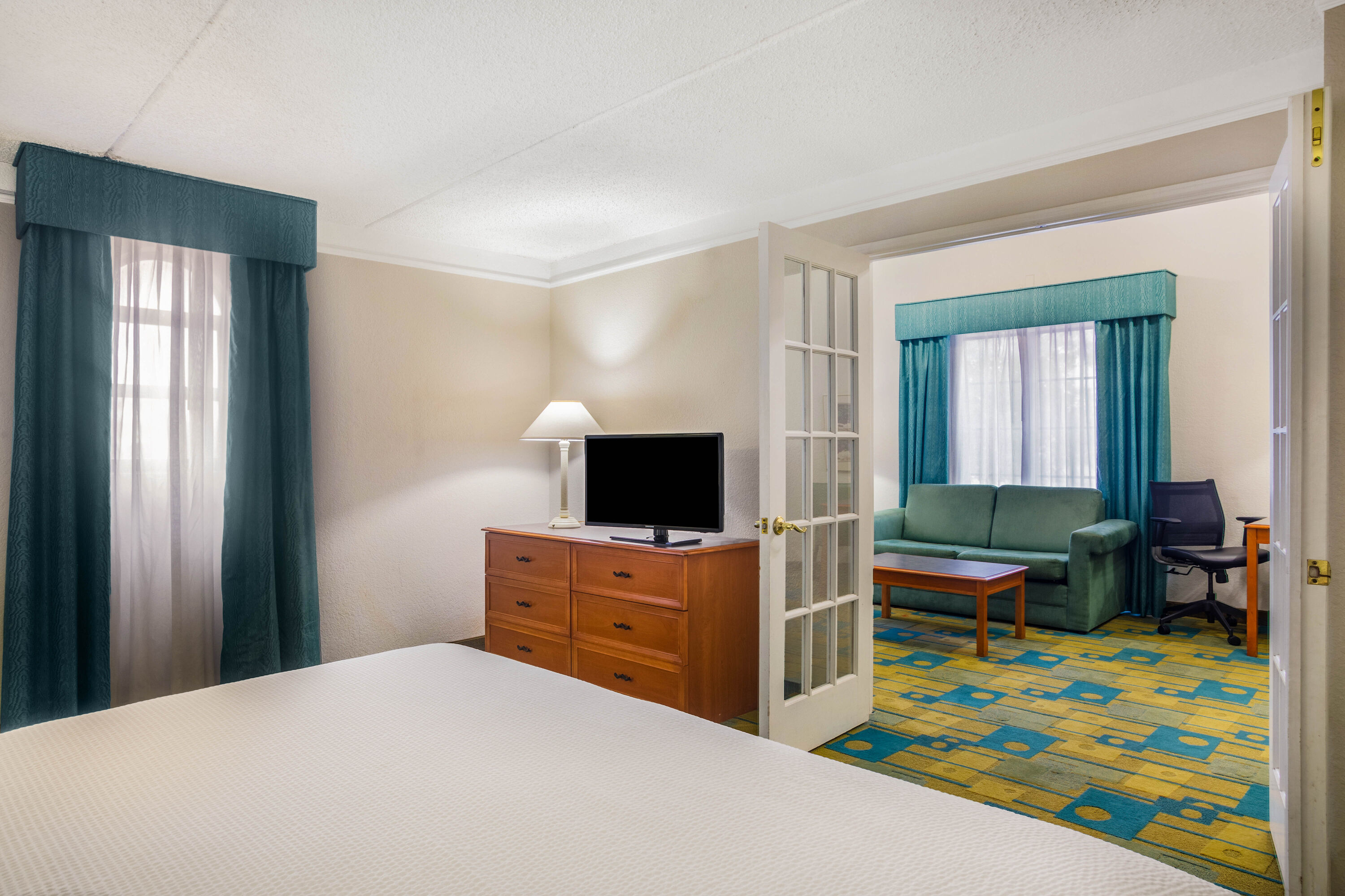 Super 8 by Wyndham Eagle Pass suite in Eagle Pass, Texas