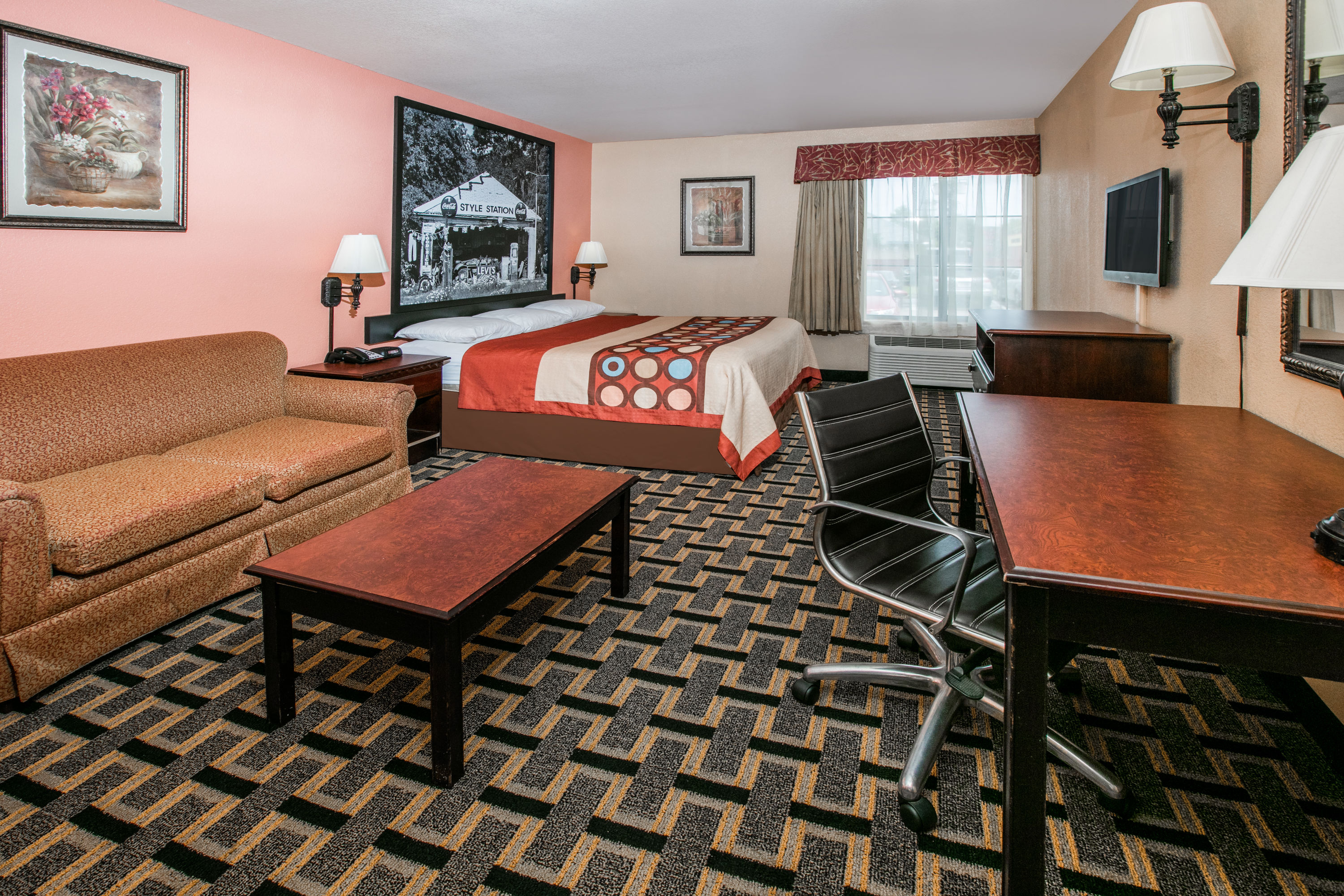 Guest room at the Super 8 by Wyndham Farmers Branch/North Dallas in Farmers Branch, Texas