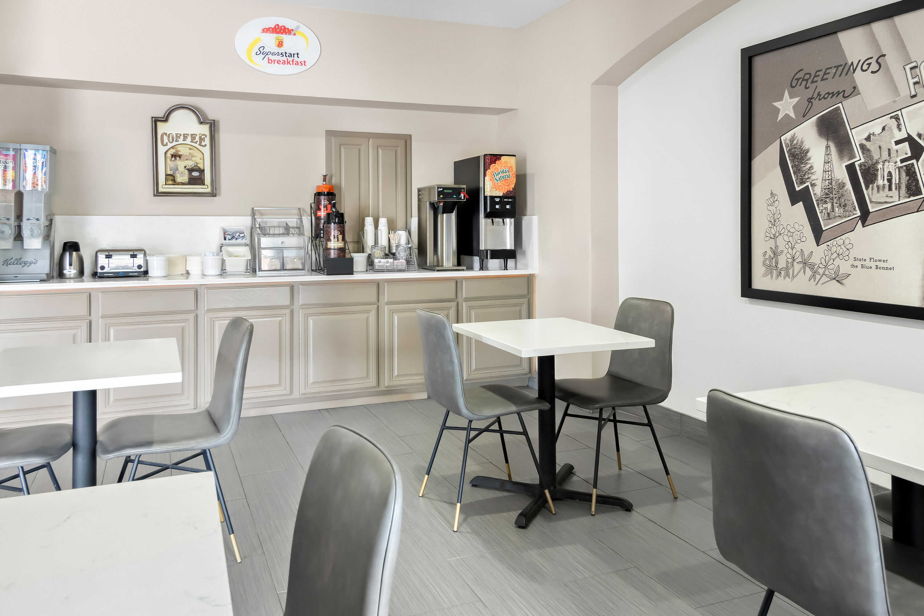 Super 8 by Wyndham Fort Worth Stockyards restaurant breakfast area with seating in Fort Worth, Texas