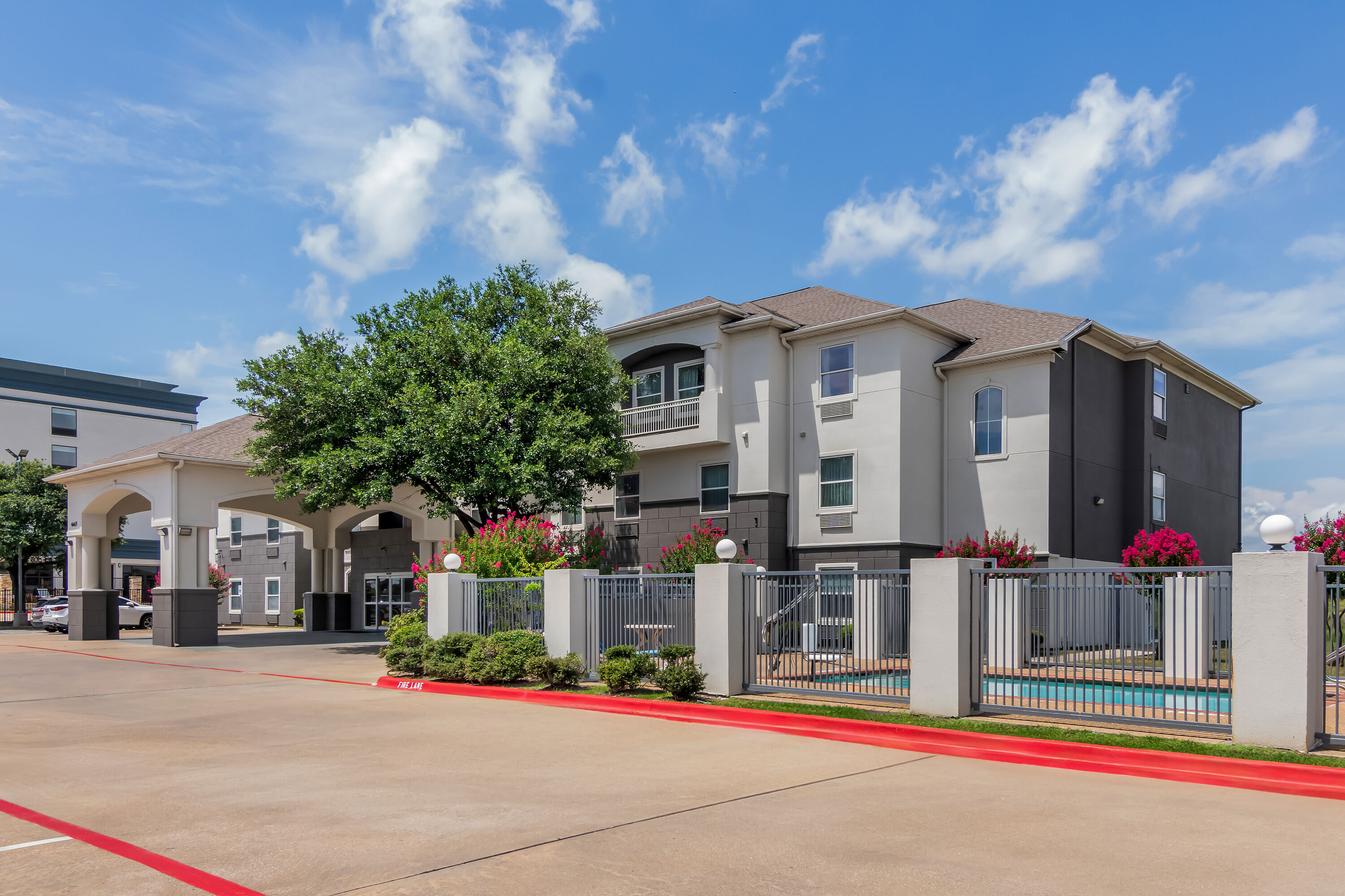 Exterior Day Image of Super 8 by Wyndham Fort Worth Stockyards hotel in Fort Worth, Texas