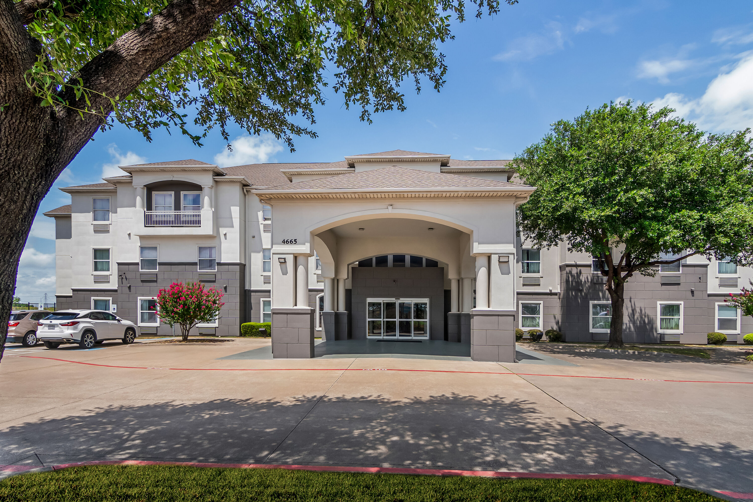 Exterior Day Image of Super 8 by Wyndham Fort Worth Stockyards hotel in Fort Worth, Texas