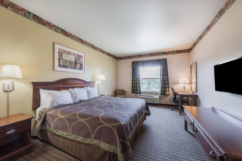 Guest room at the Super 8 Fort Worth North/Meacham Blvd in Fort Worth, Texas