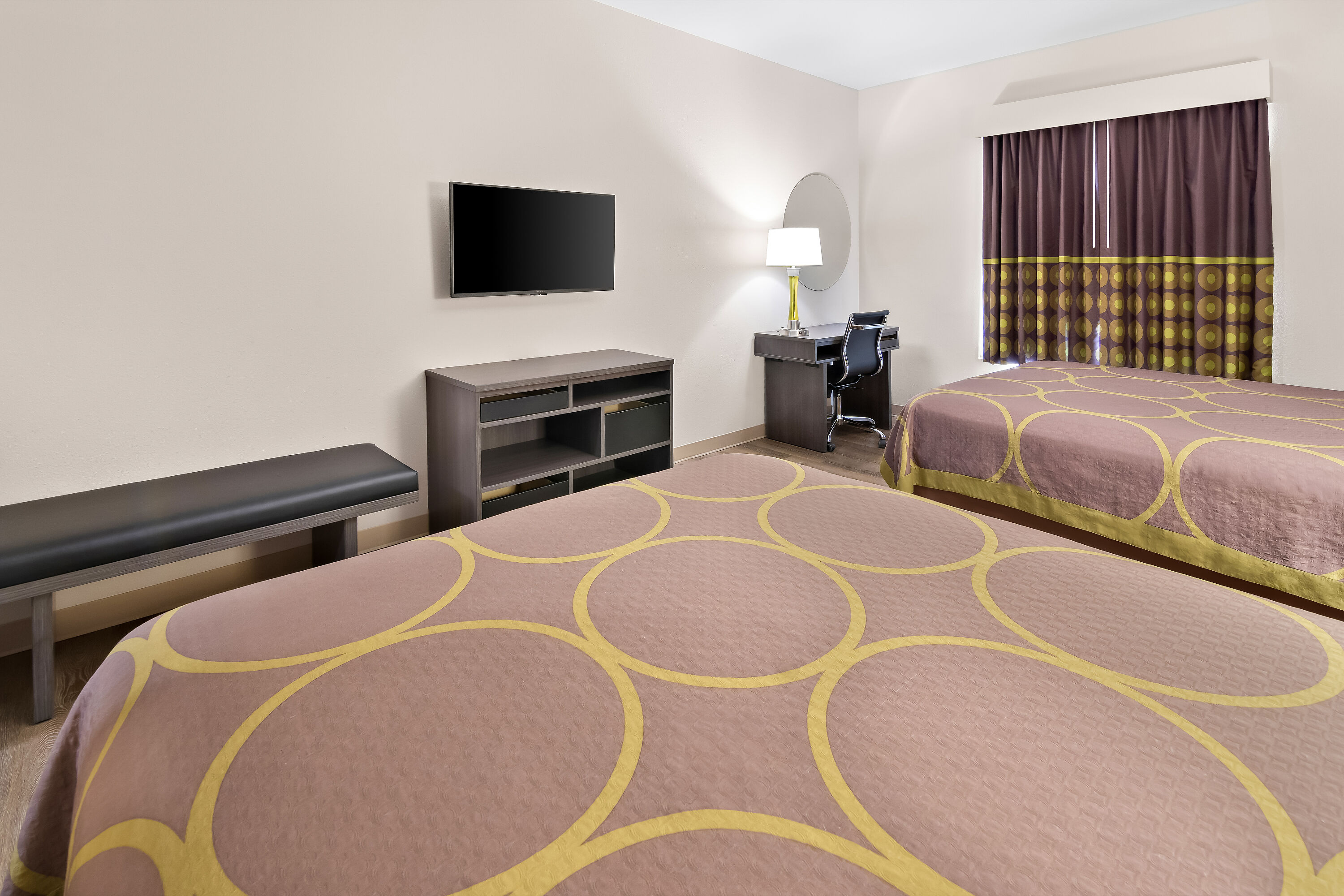 Double bed guest room at the Super 8 by Wyndham Fort Worth Stockyards in Fort Worth, Texas