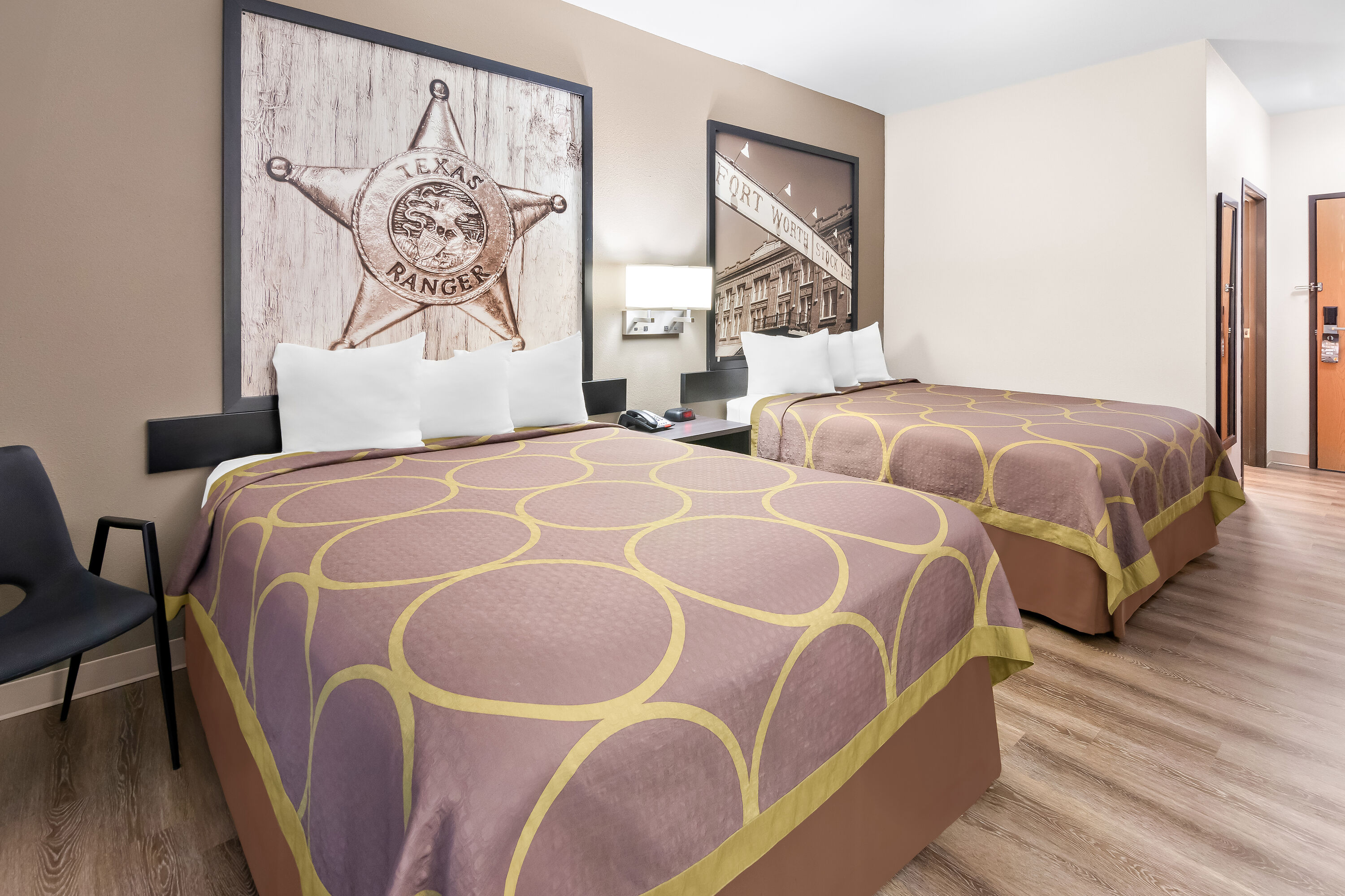 Double bed guest room at the Super 8 by Wyndham Fort Worth Stockyards in Fort Worth, Texas