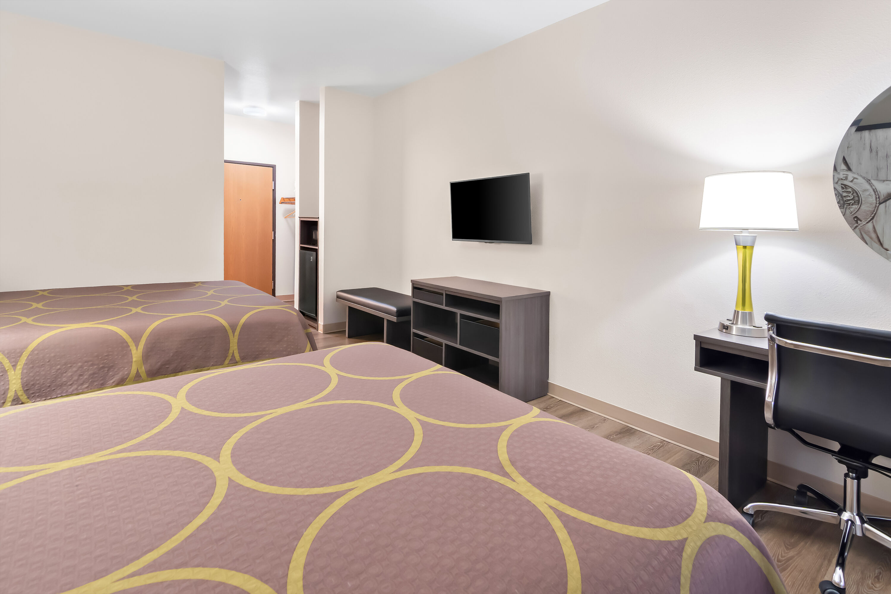 Double bed guest room at the Super 8 by Wyndham Fort Worth Stockyards in Fort Worth, Texas