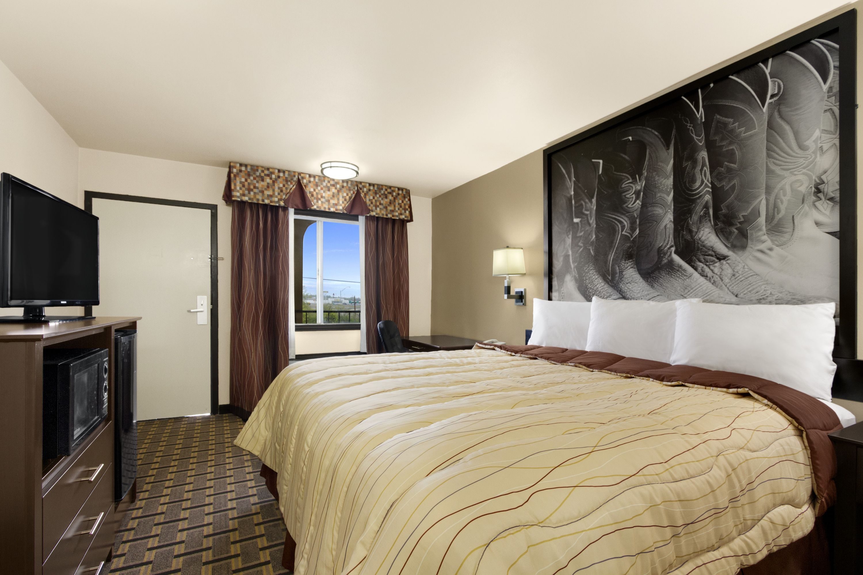 Guest room at the Super 8 by Wyndham Fort Worth TX in Fort Worth, Texas