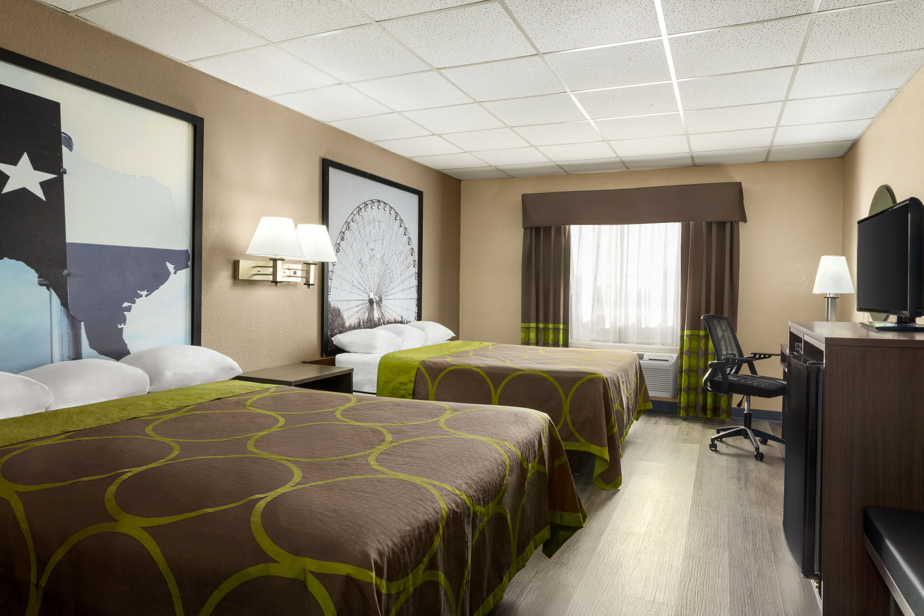 Guest room at the Super 8 by Wyndham Gainesville TX in Gainesville, Texas