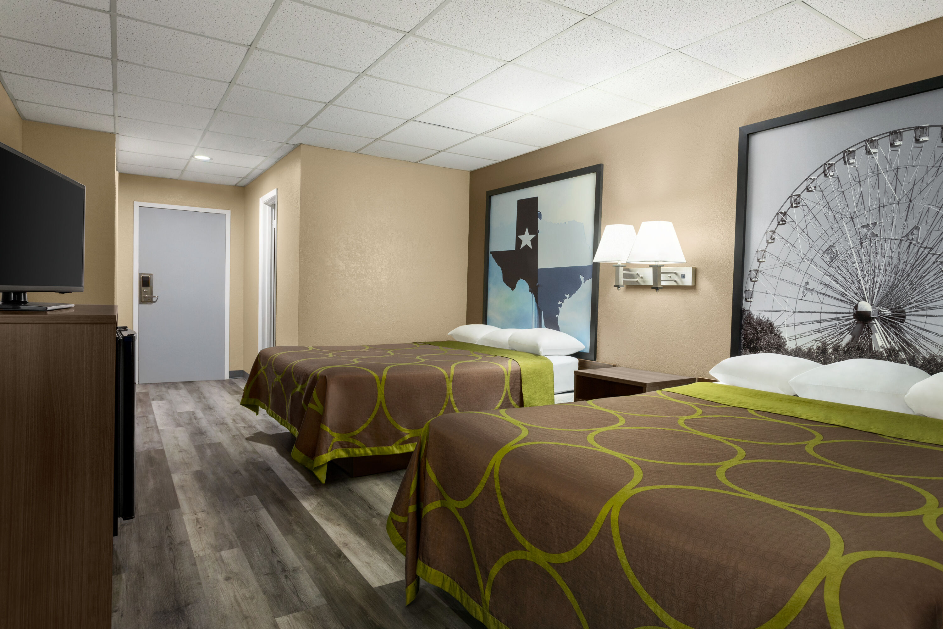 Guest room at the Super 8 by Wyndham Gainesville TX in Gainesville, Texas