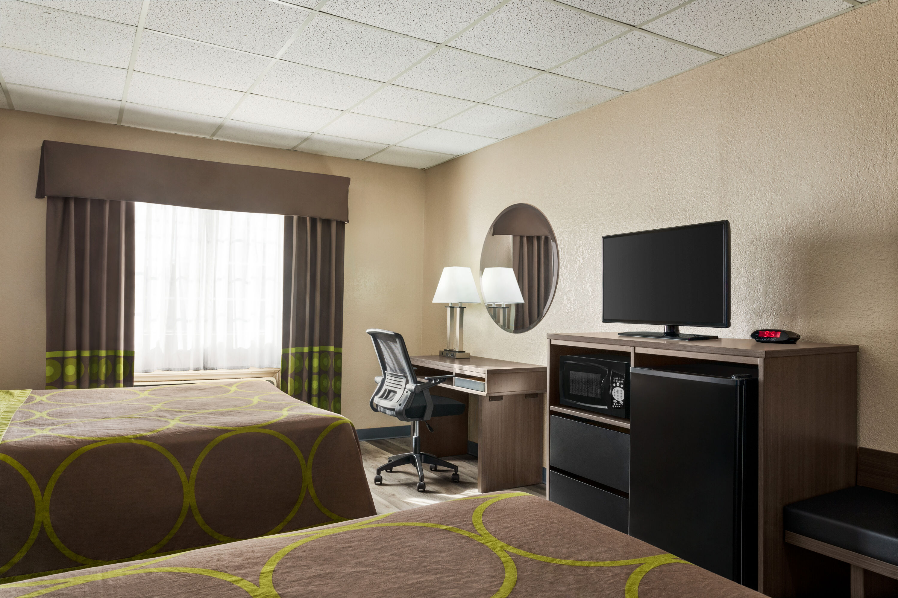 Guest room at the Super 8 by Wyndham Gainesville TX in Gainesville, Texas