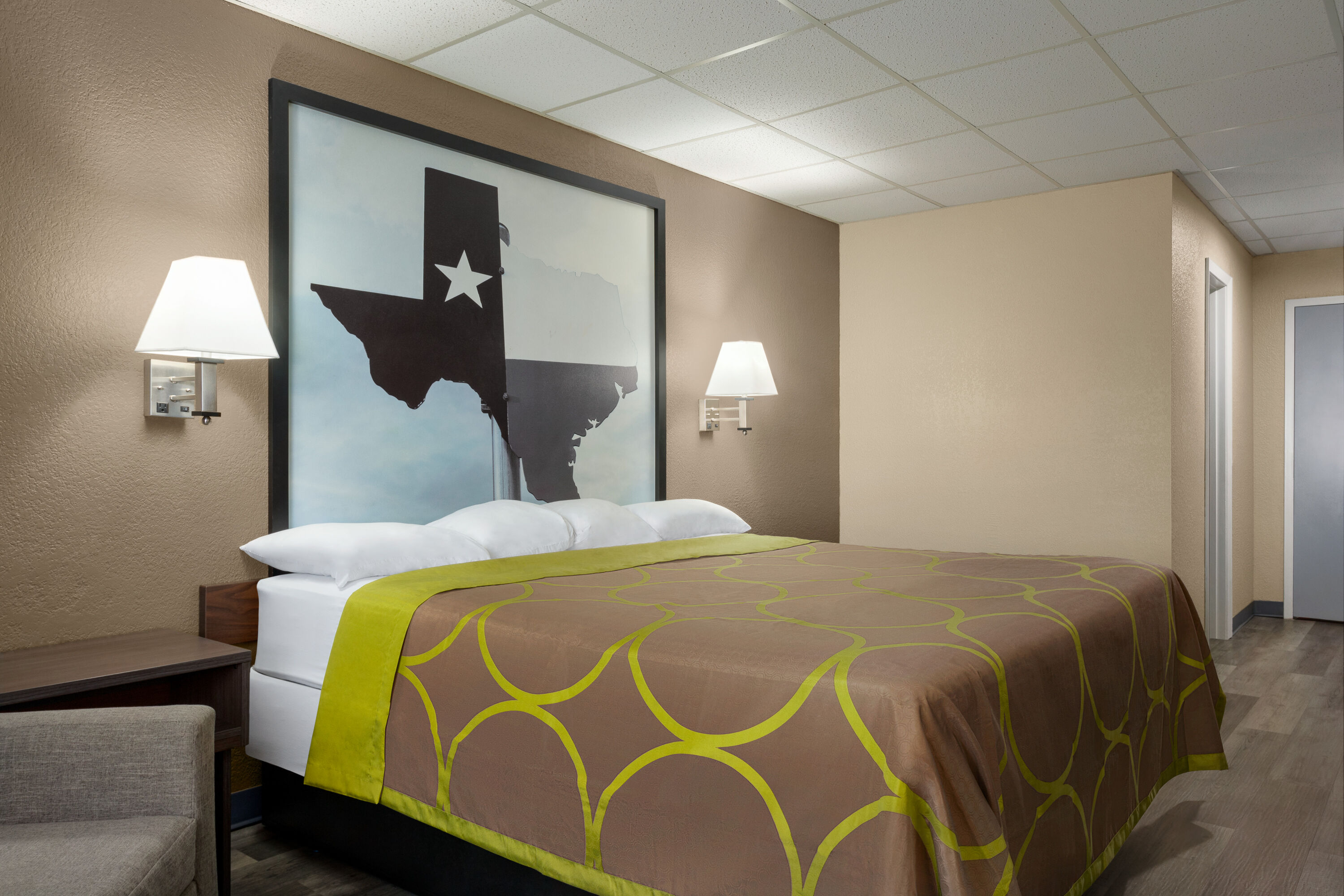 Guest room at the Super 8 by Wyndham Gainesville TX in Gainesville, Texas