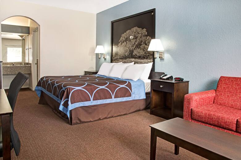 Guest room at the Super 8 Houston/Brookhollow NW in Houston, Texas