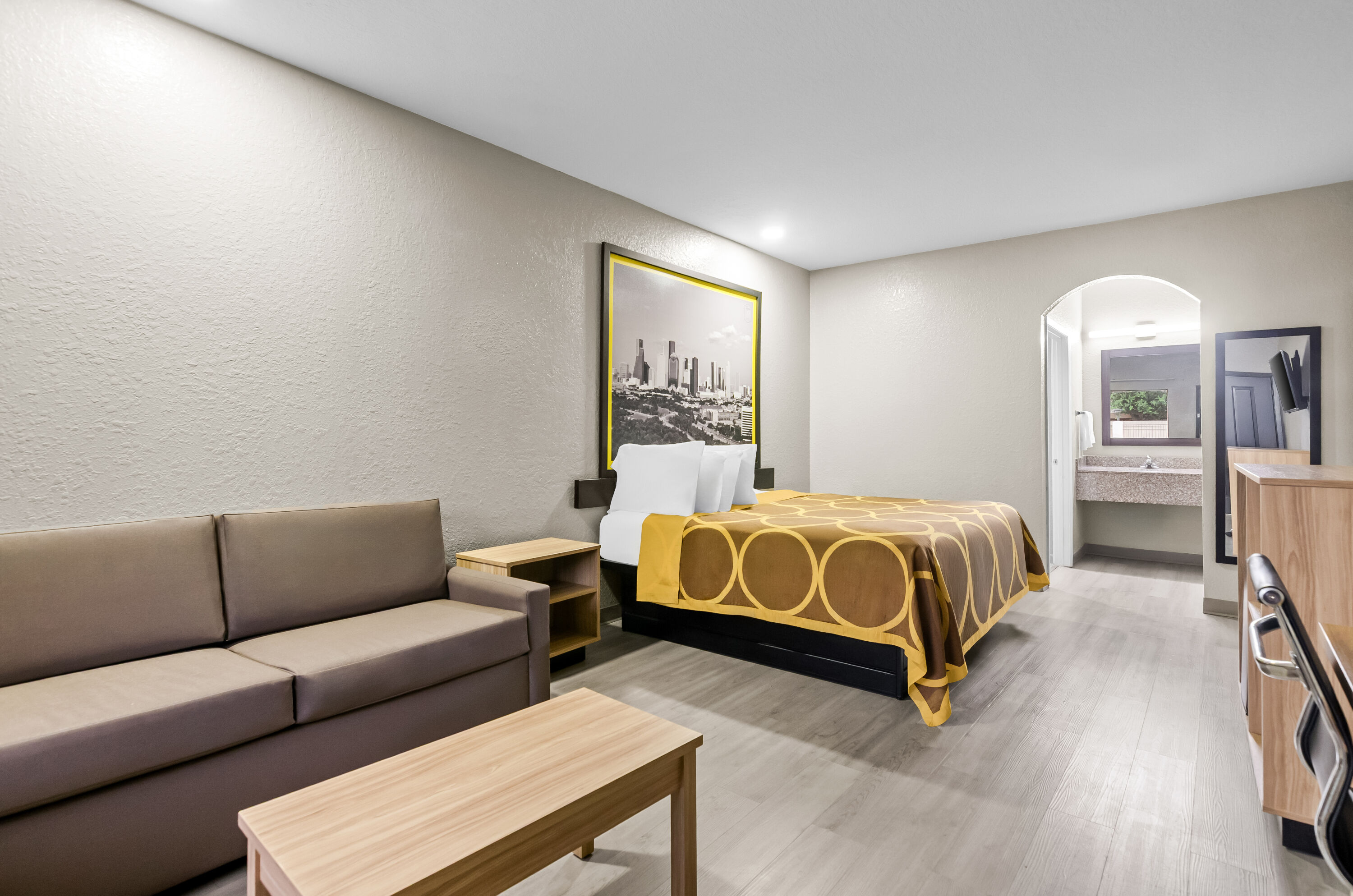 King bed guest room at the Super 8 by Wyndham Houston/Brookhollow NW in Houston, Texas